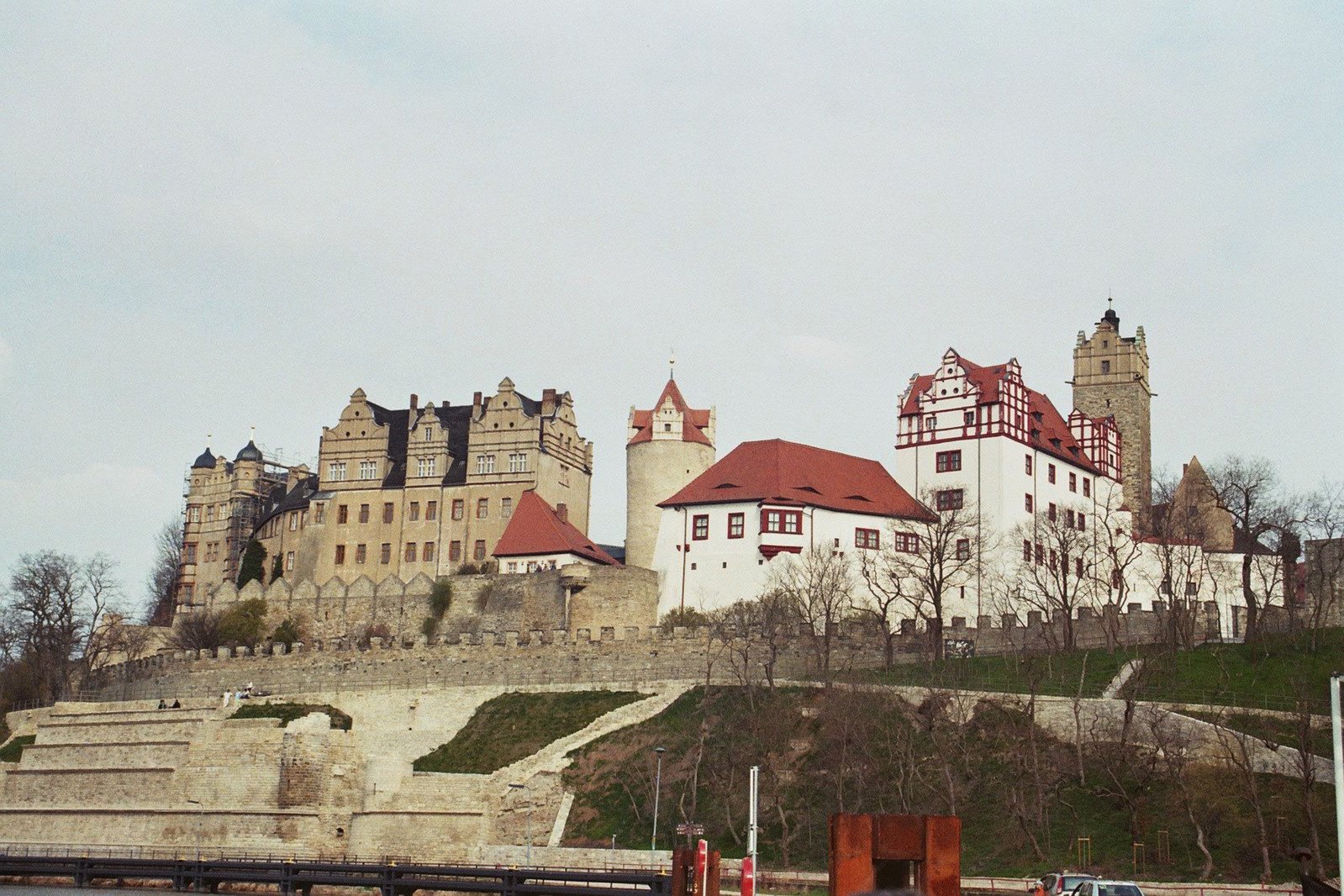 the castle on the hill is surrounded by many people