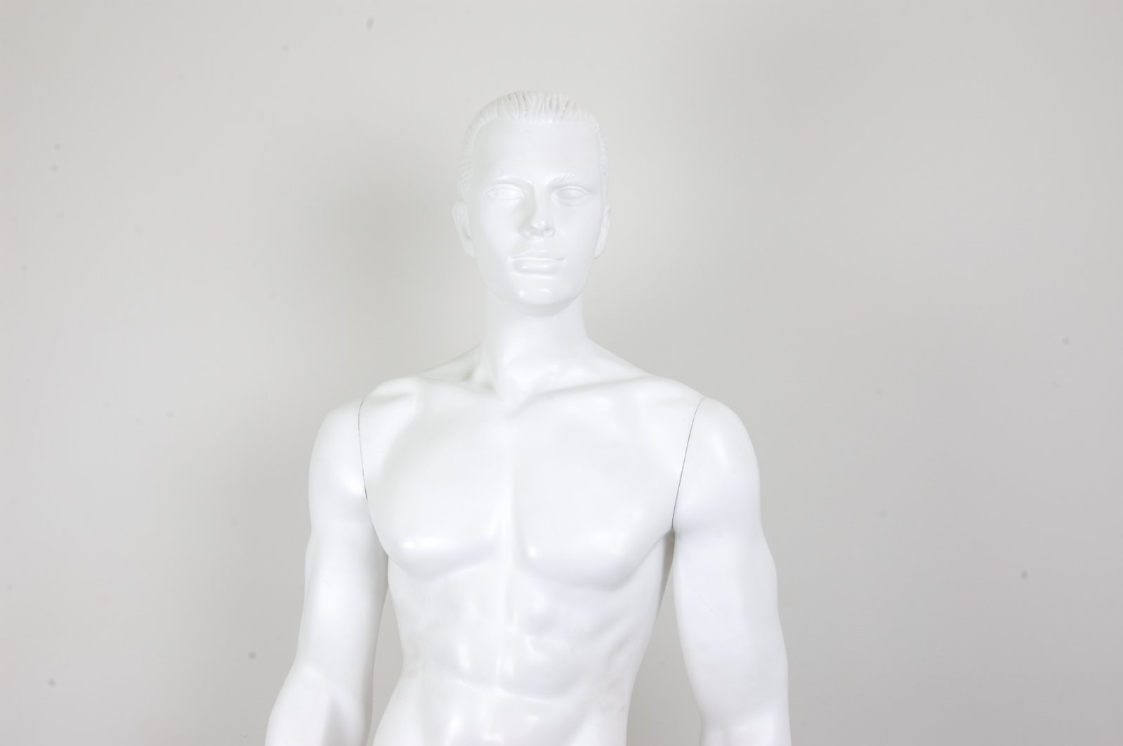 a male torso with shorts on the chest