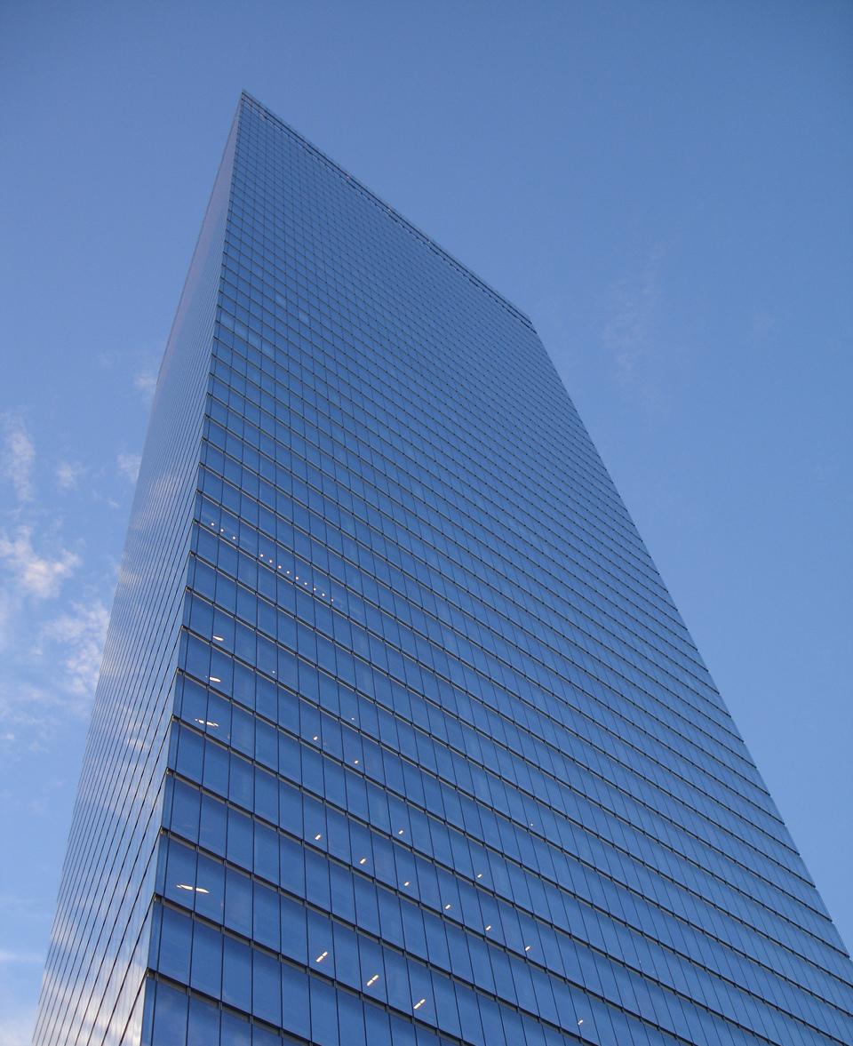 a tall skyscr building with many windows