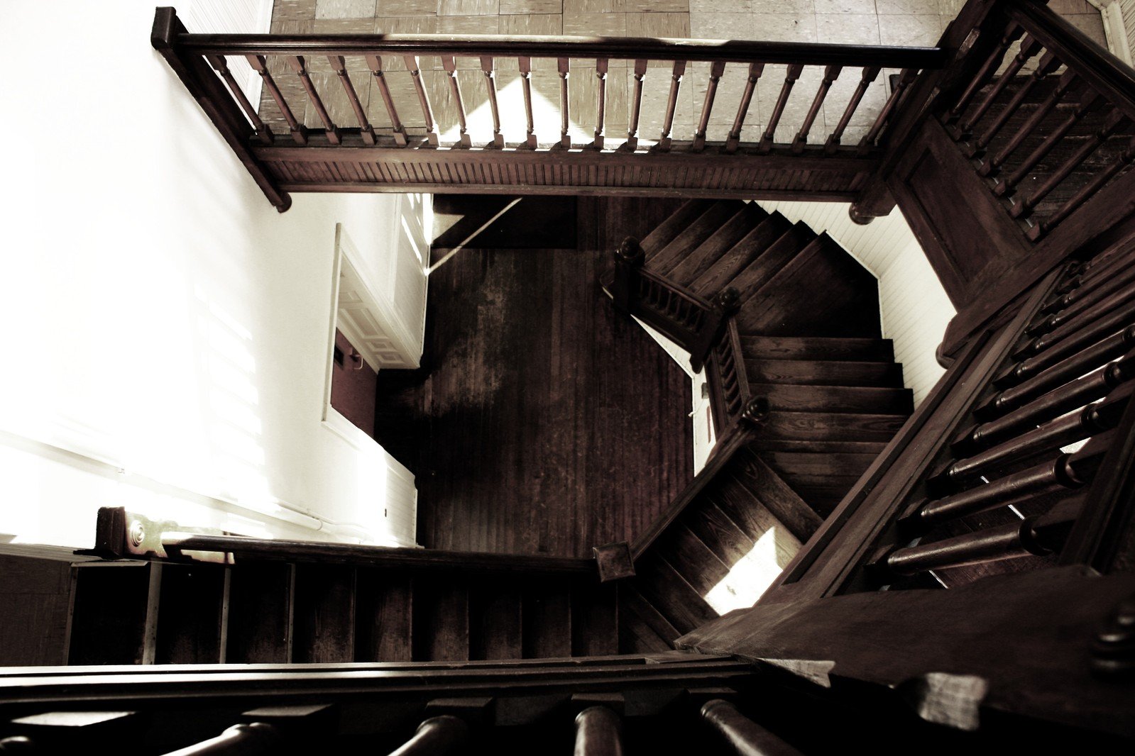 a very old set of stairs in a small house