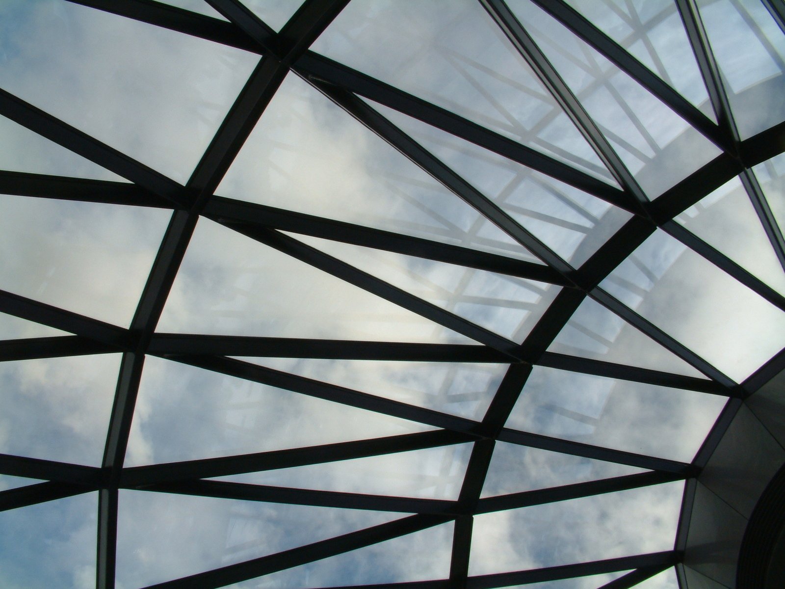 view up through the glass roof of a dome