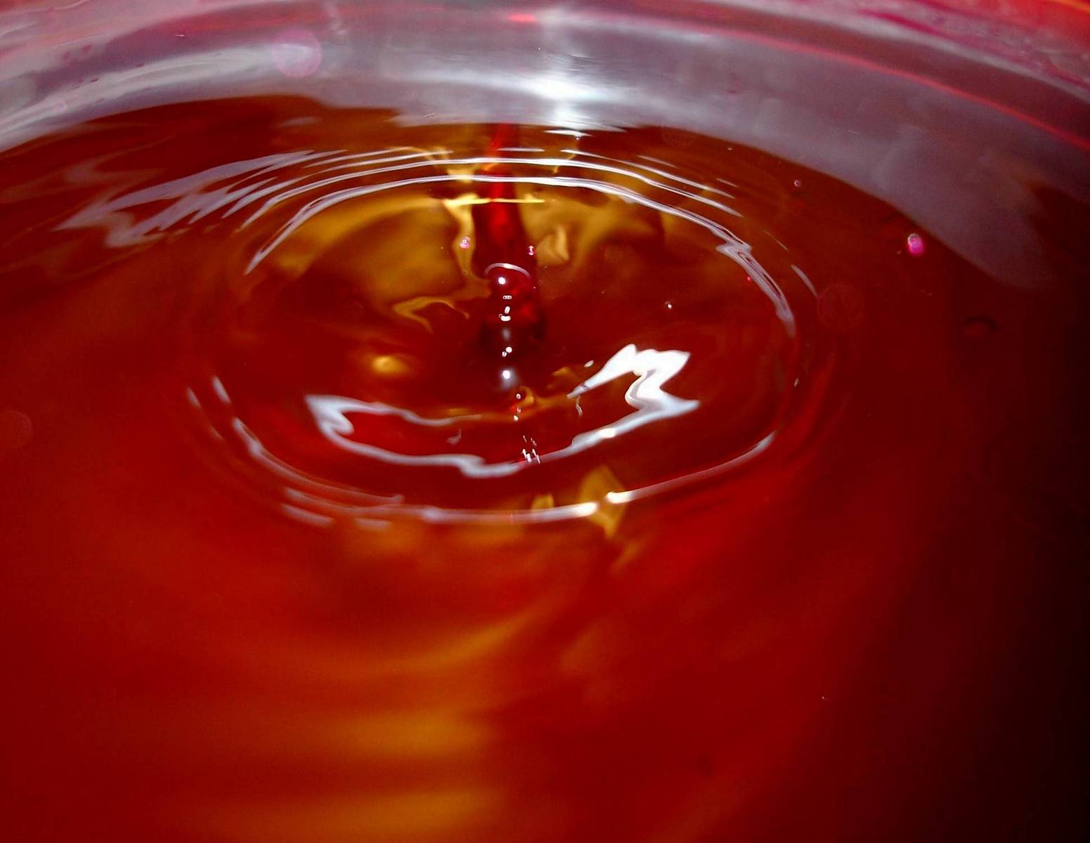 the red liquid is liquid inside of a glass