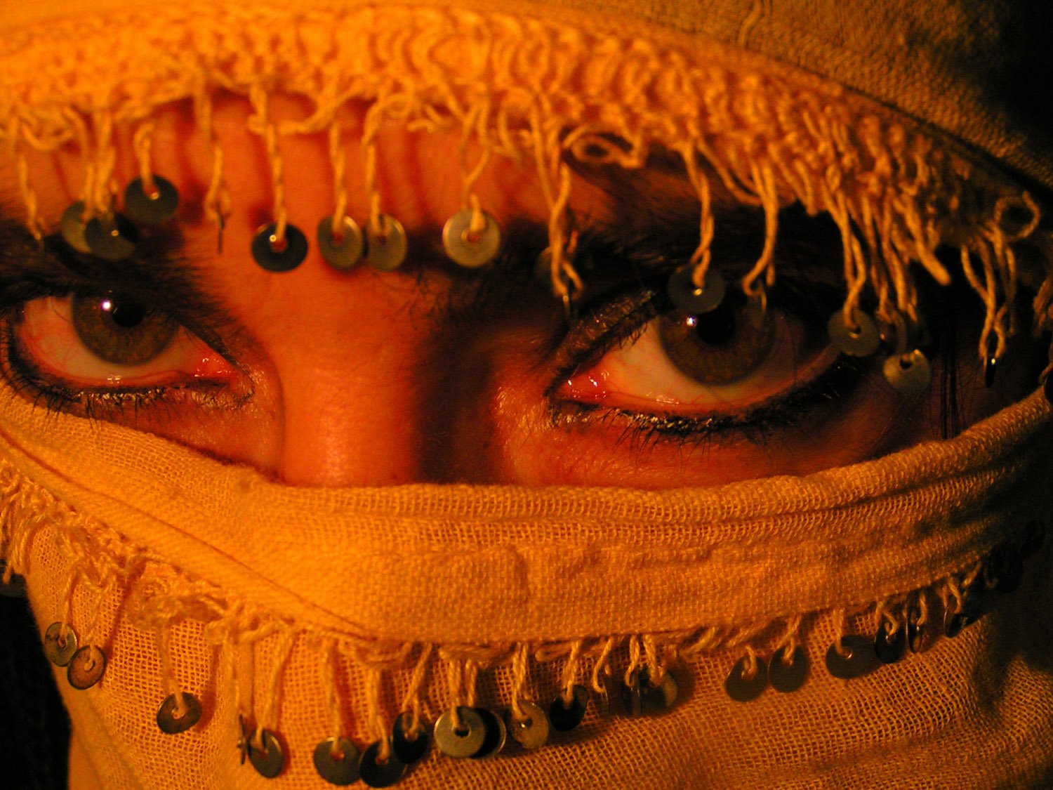an image of a woman covered in eyes