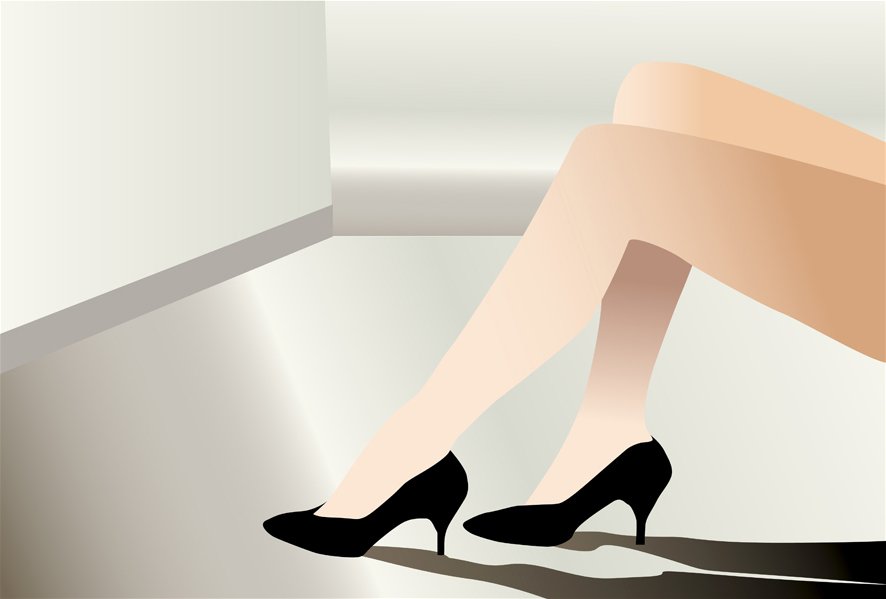 the female legs and shoes on top of a toilet