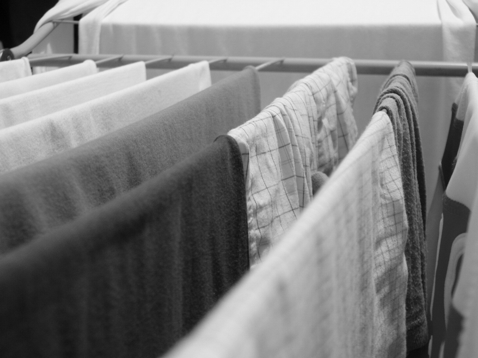 drying towels on clothes lines hanging from a clothes line