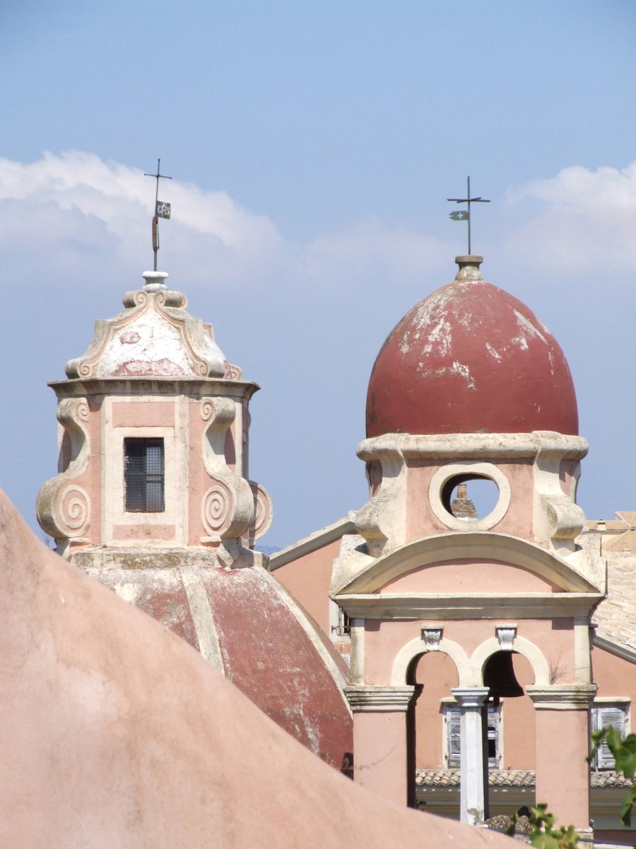 a church with a large dome and two smaller churches on top of it