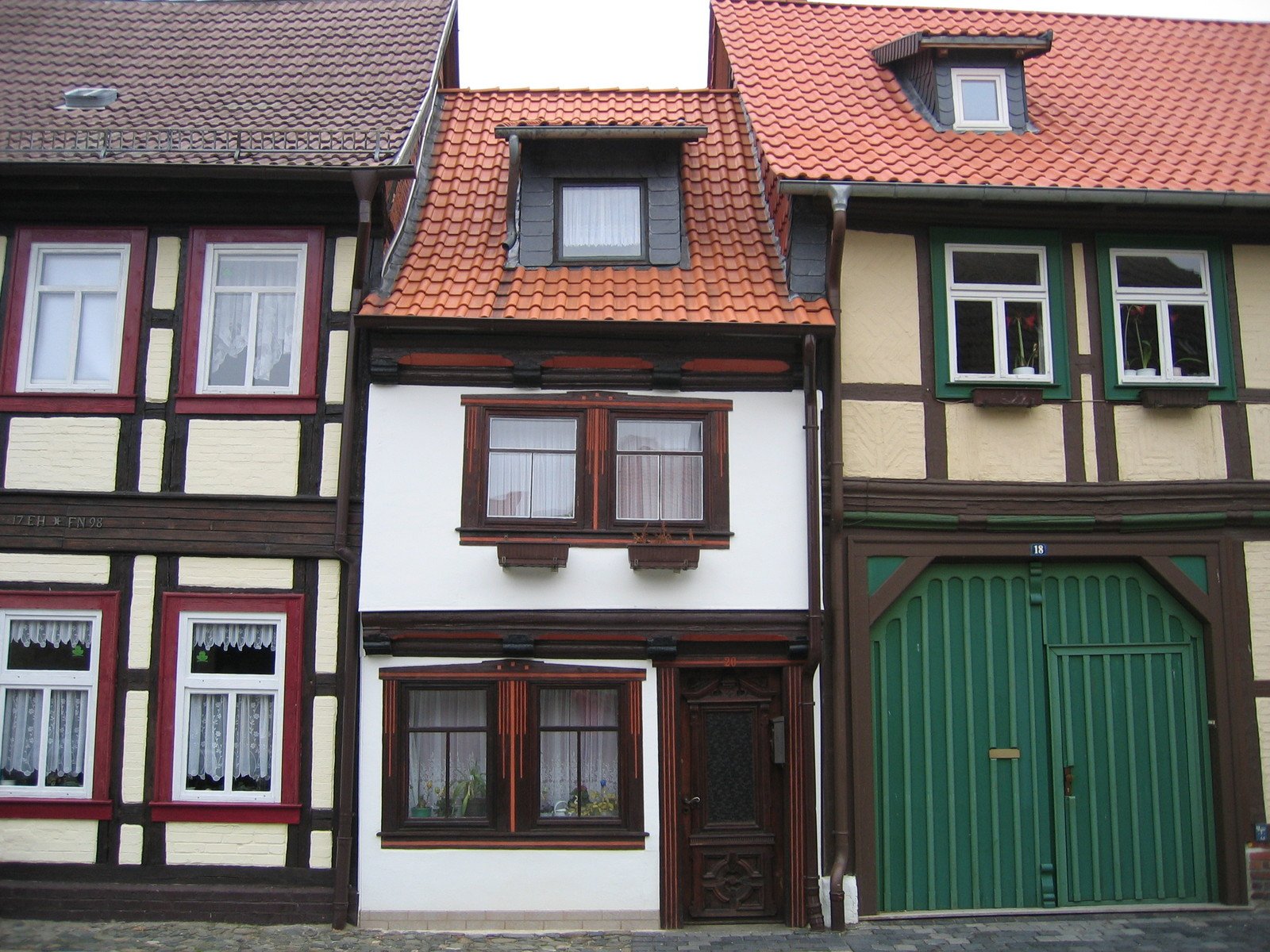 a row of colorful houses next to each other