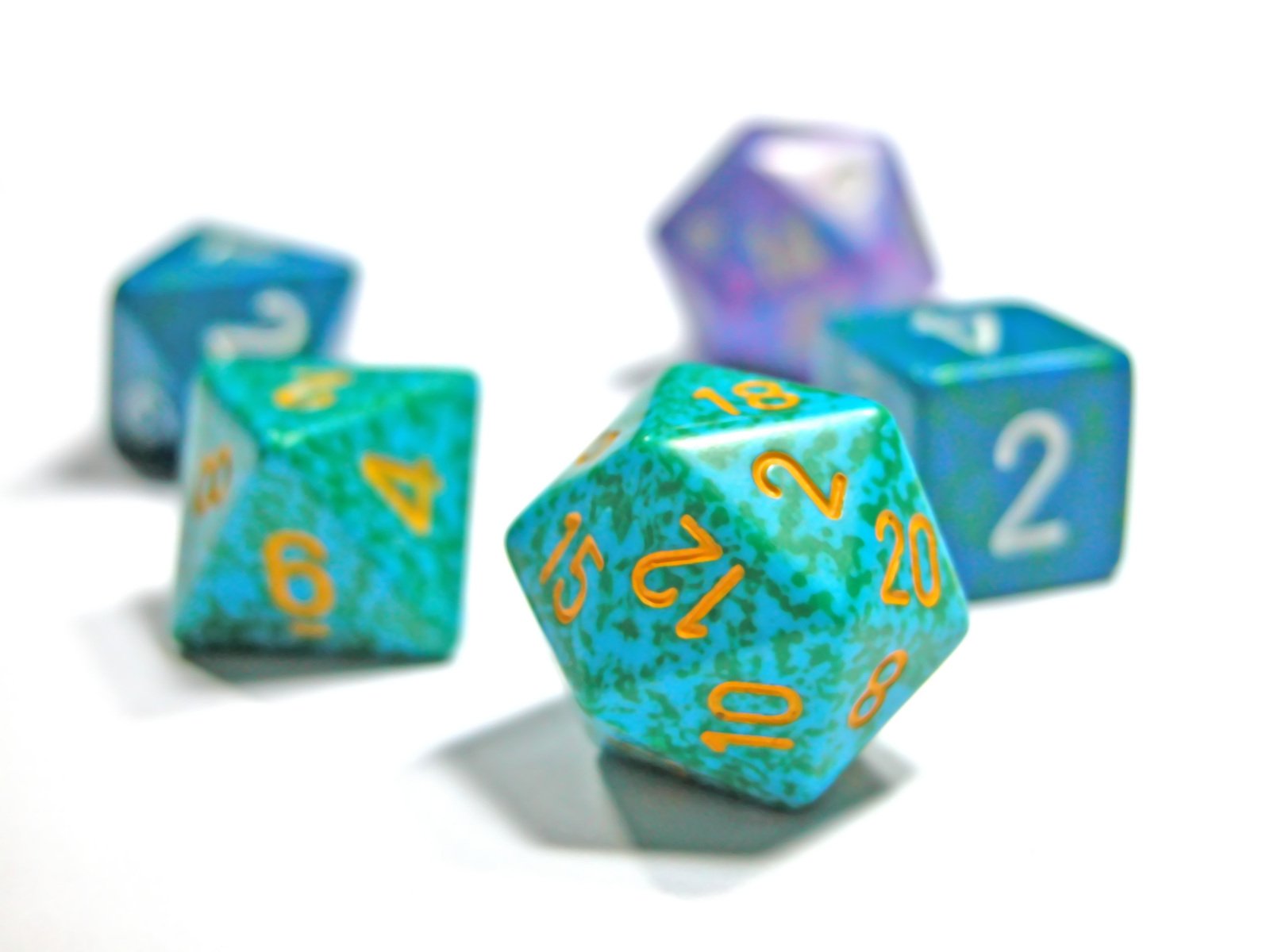 some dices with numbers on them are laying on the floor