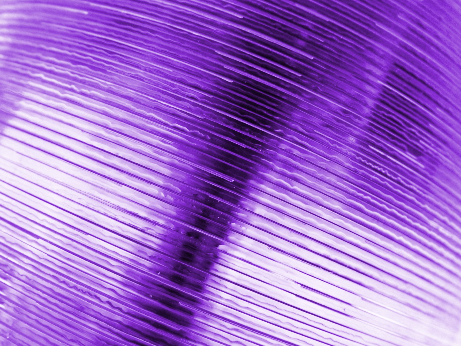 a blurred purple background with lines and shapes