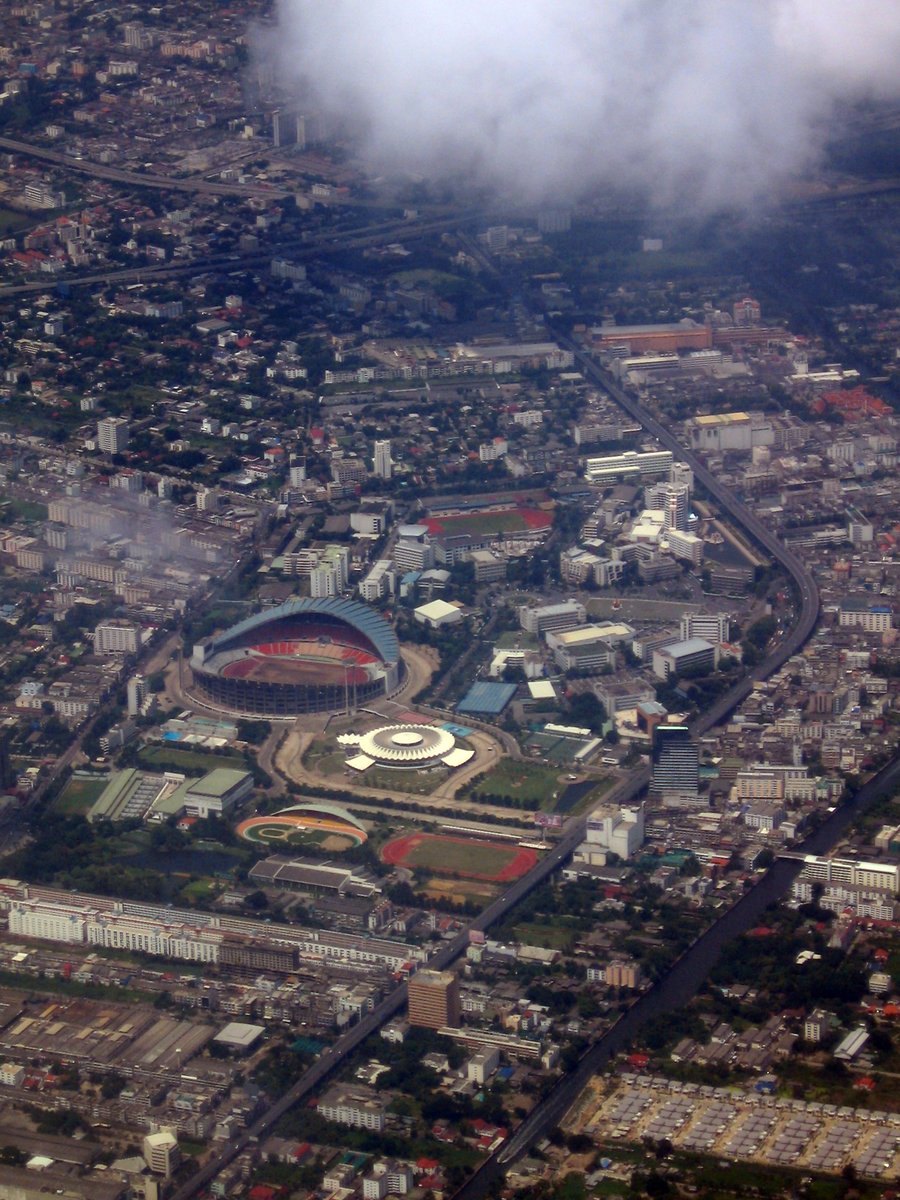 a view of a city with an oval structure