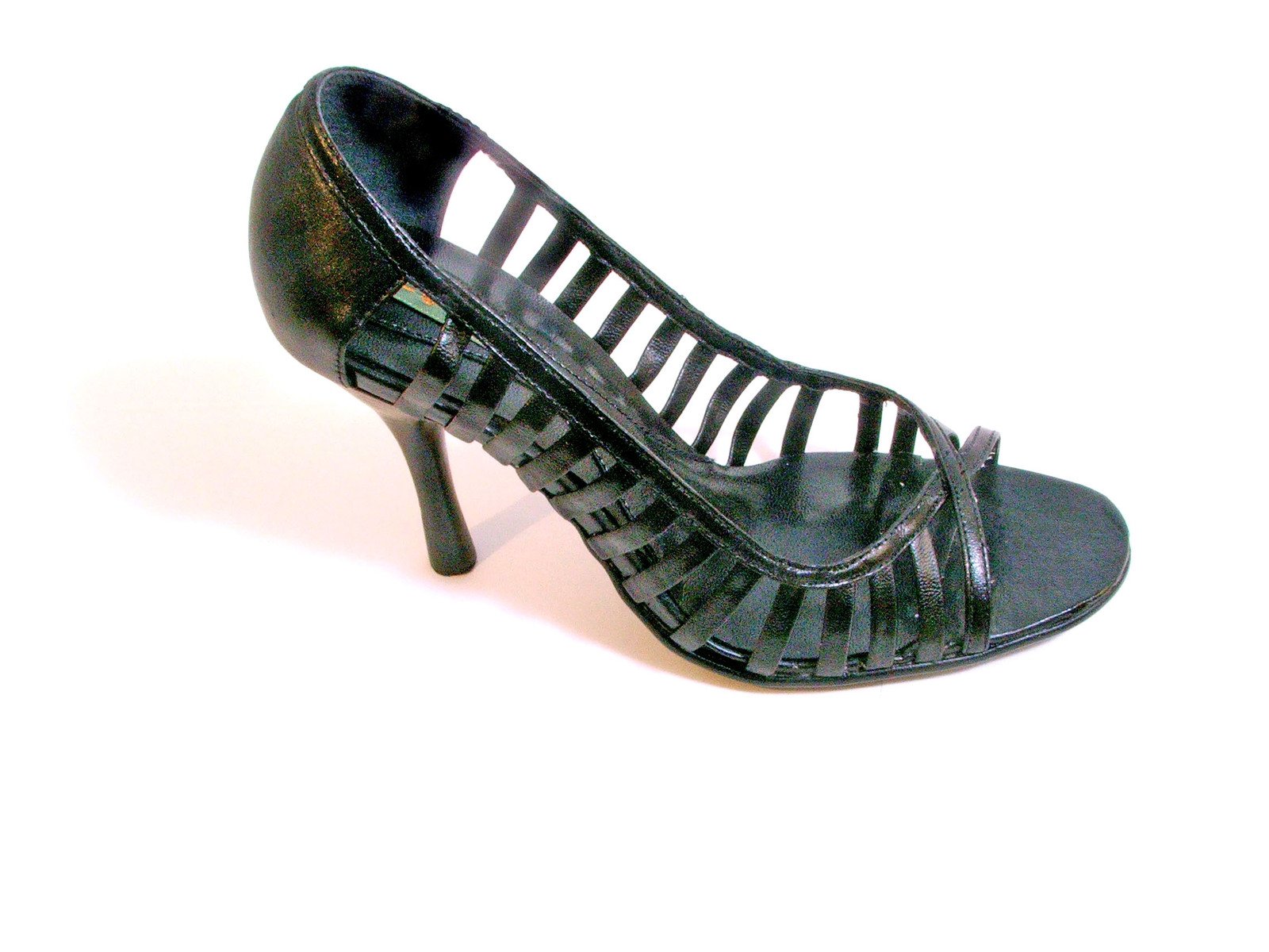 an image of high heel shoe that has been cut into the front