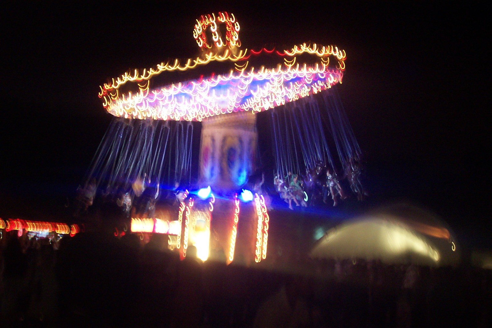 some lights on the front of a carnival ride