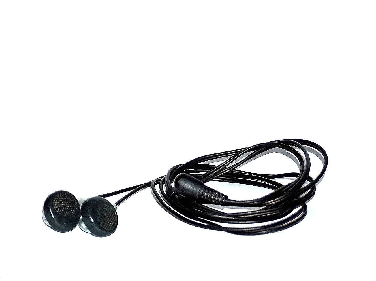 two ear buds sitting next to each other