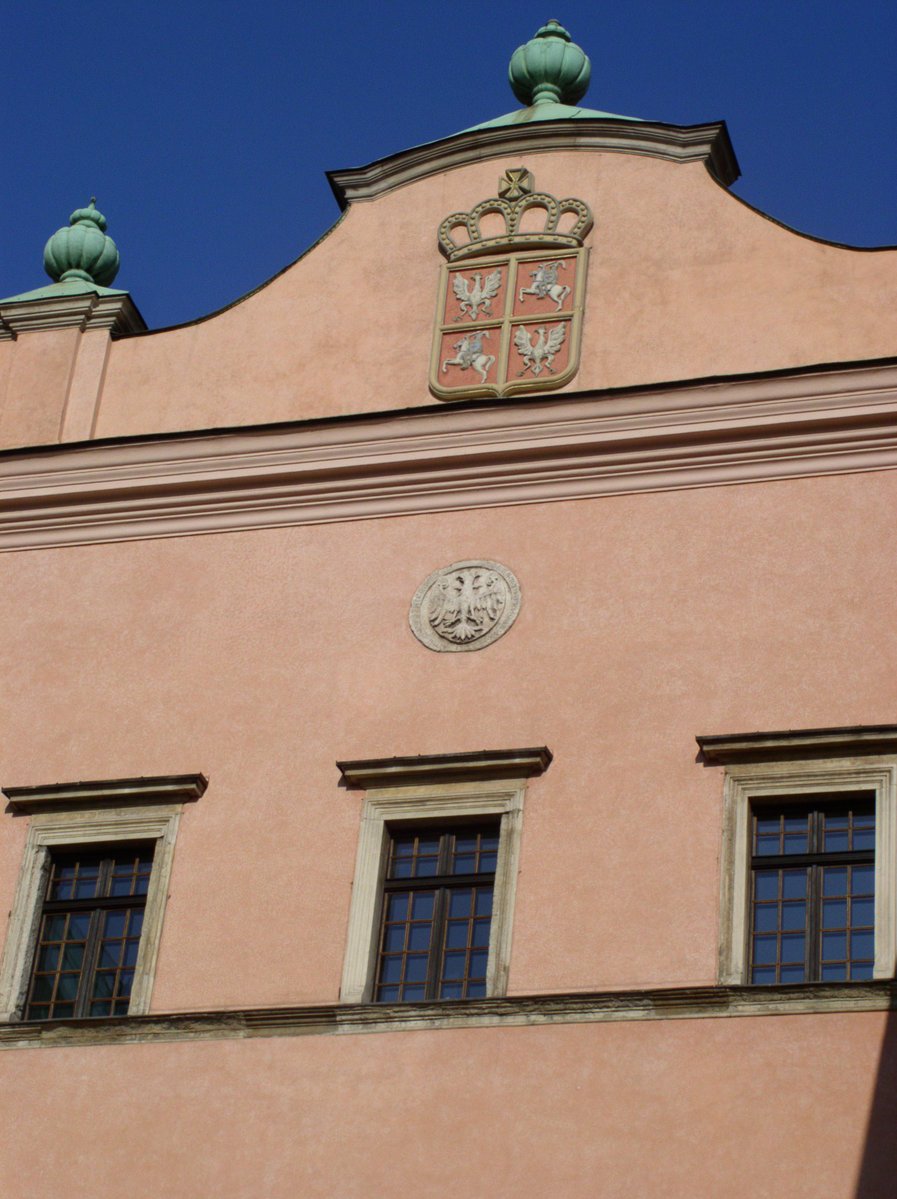 the clock has been carved onto the side of this building