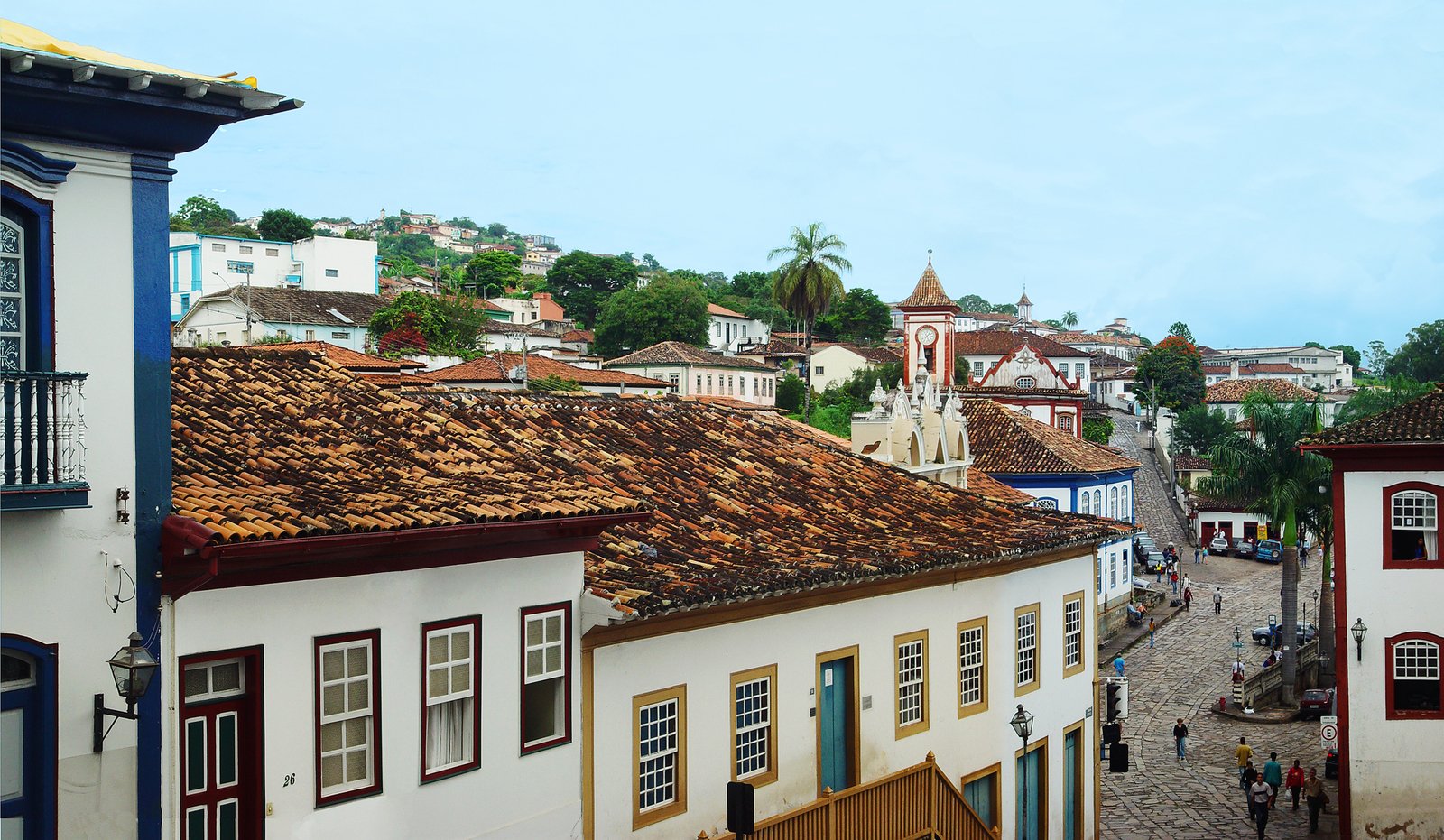 people walking along a street in old town