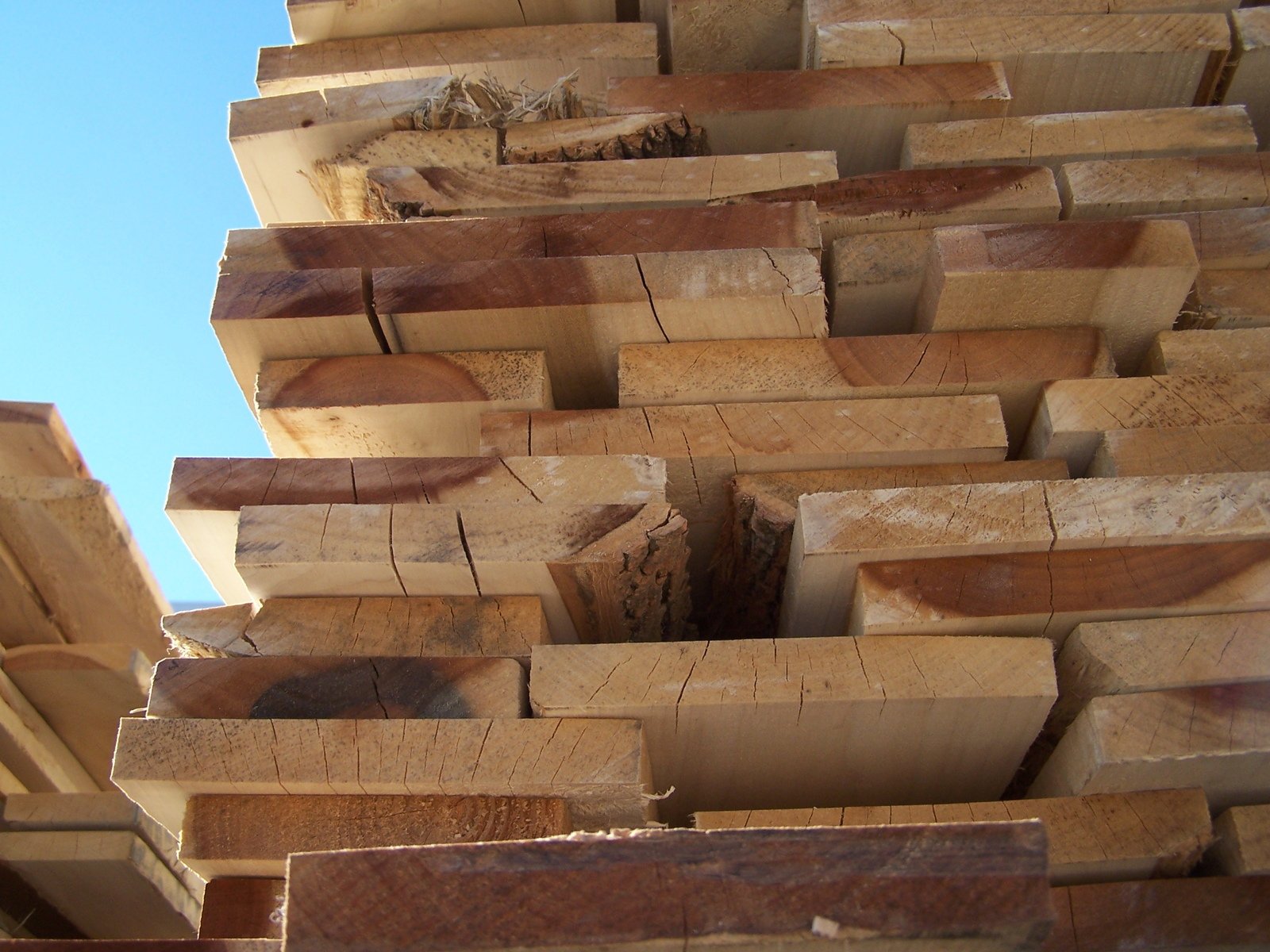 stacks of wooden planks with their tops missing