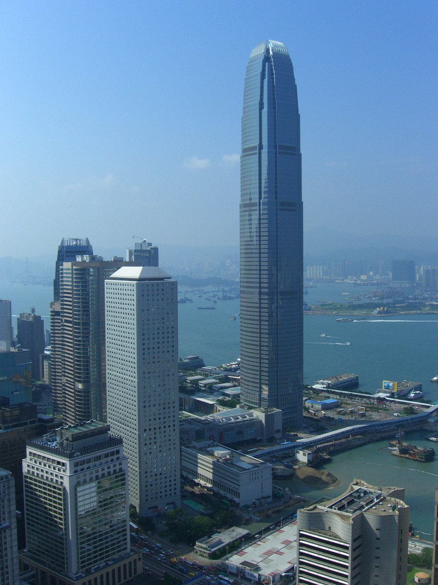 this is an image of two tall buildings in the city