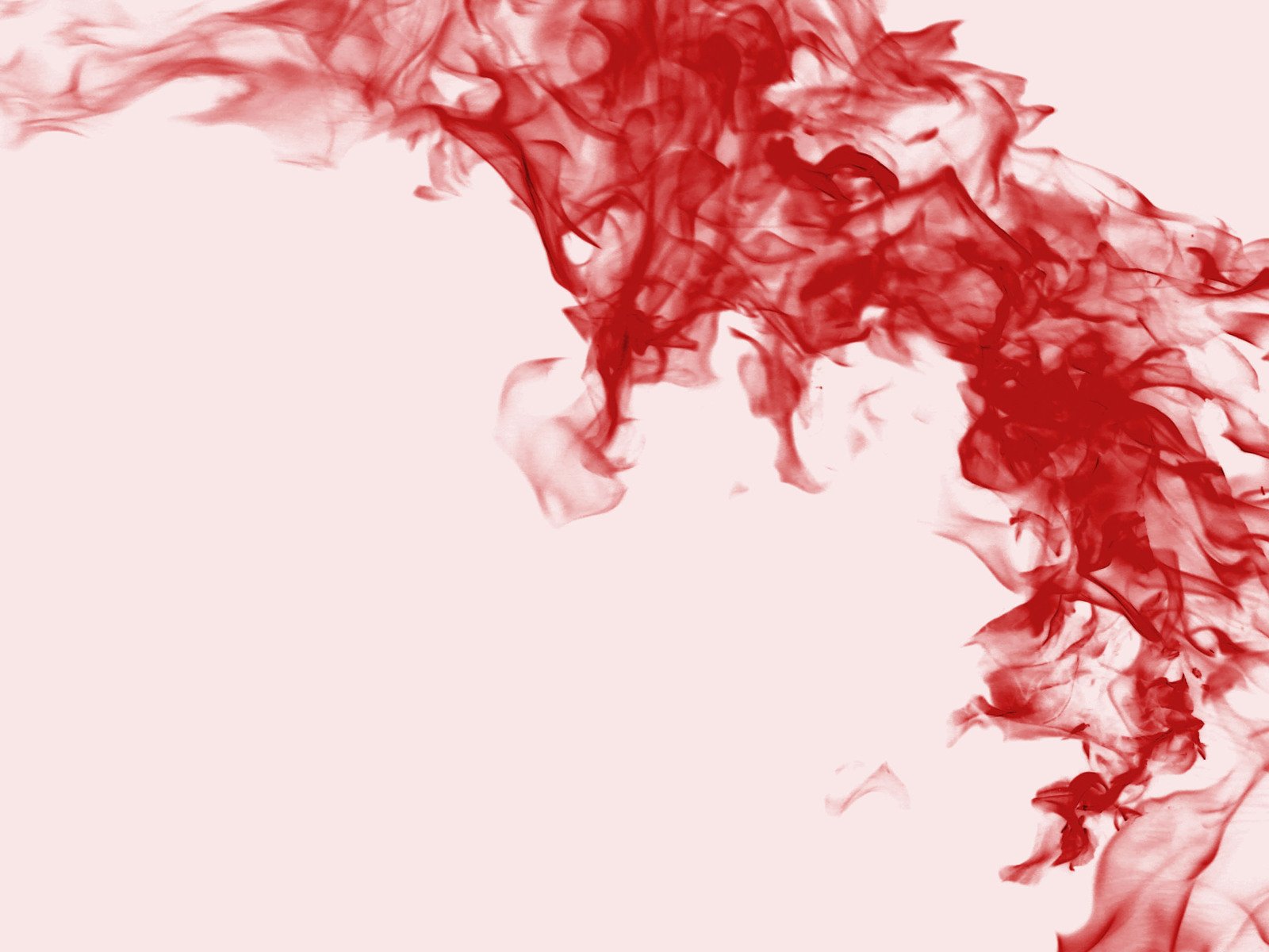 red smoke swirling from a blender to a white background