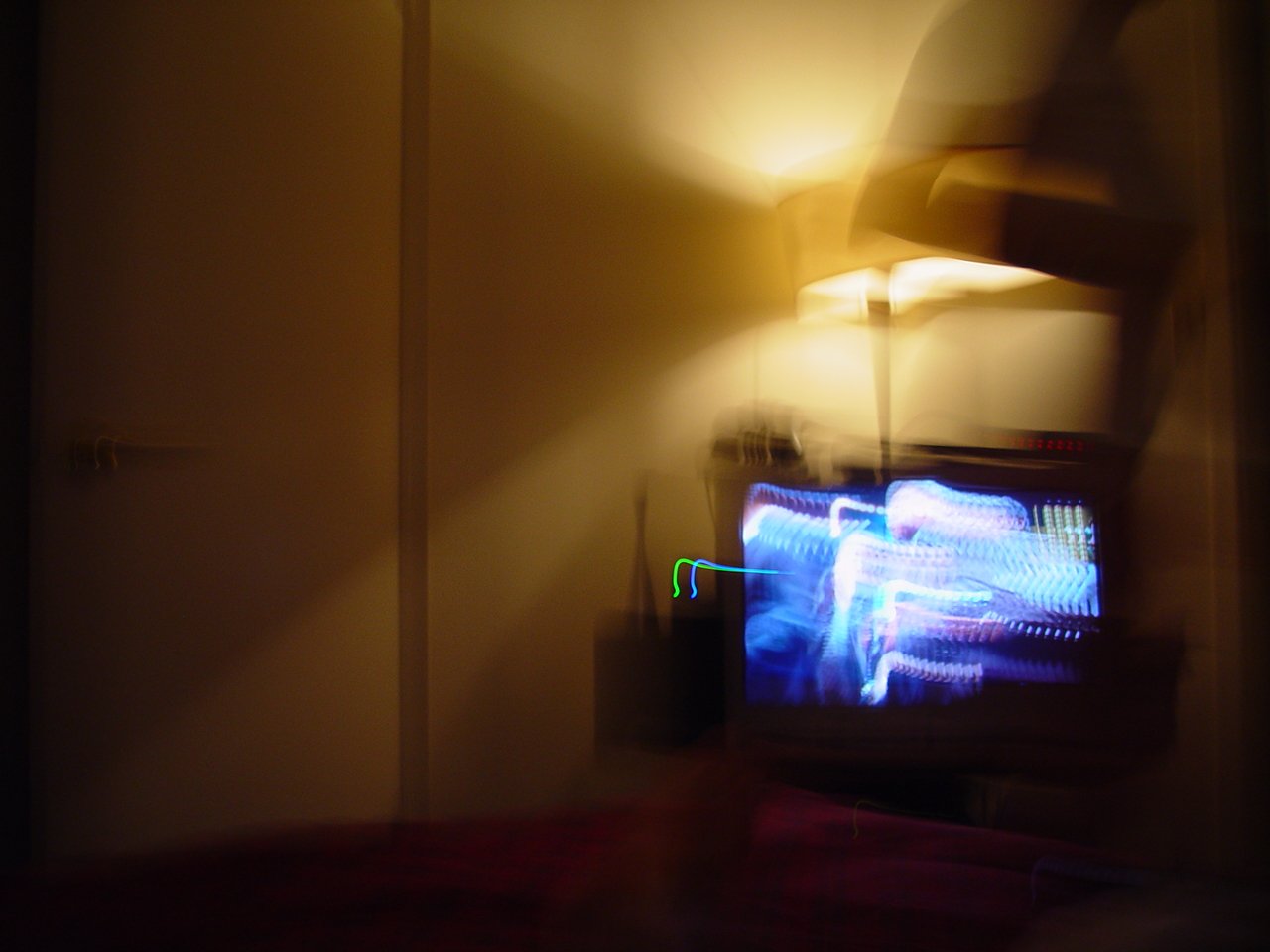 blurry pograph of a living room with television