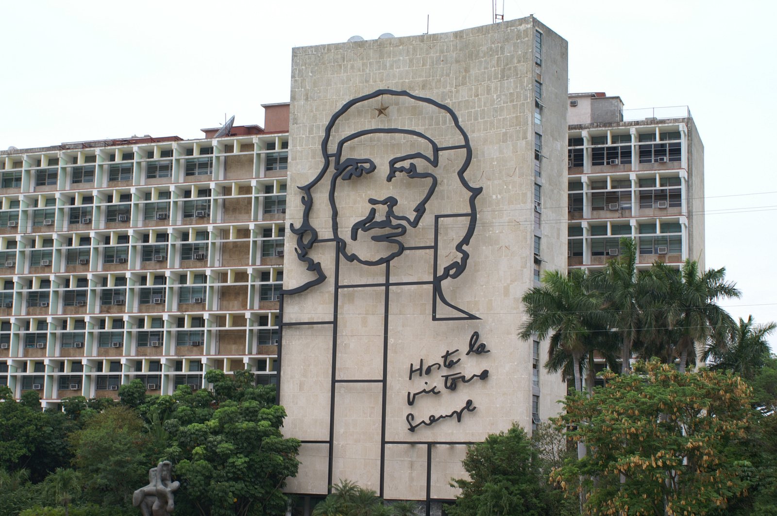 a building with a giant portrait on it's side