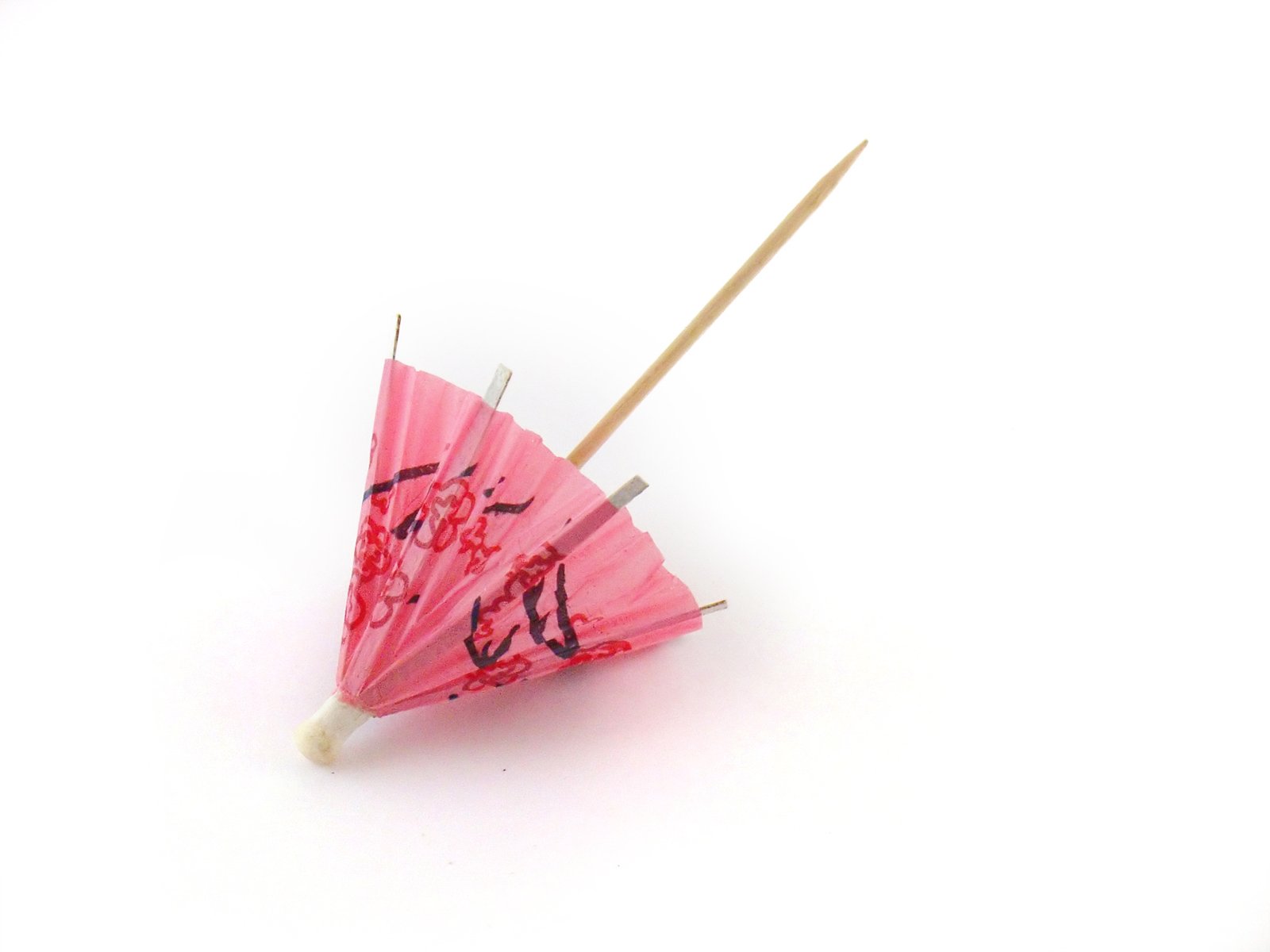 pink party parasols with writing on them and red wooden sticks