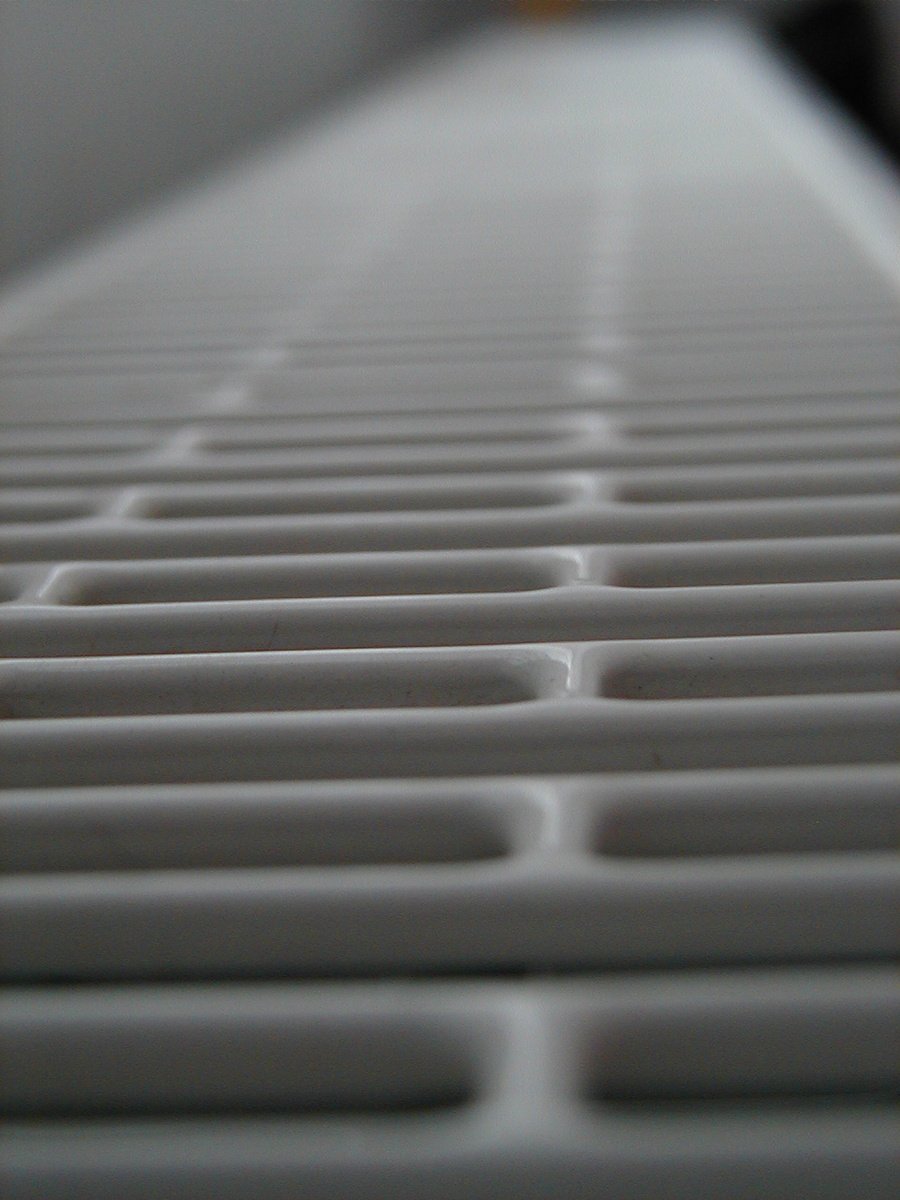 closeup view of an empty white object on top of a table