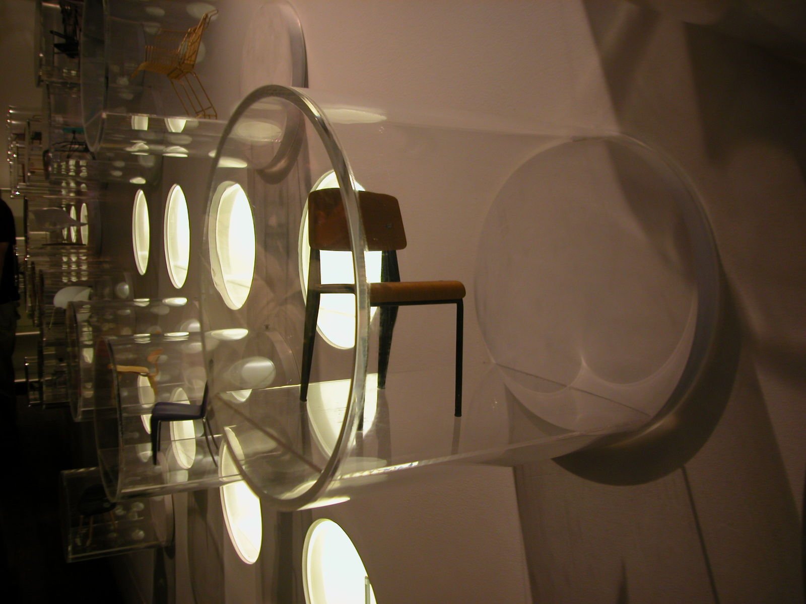 a display with multiple light types, in front of a white wall