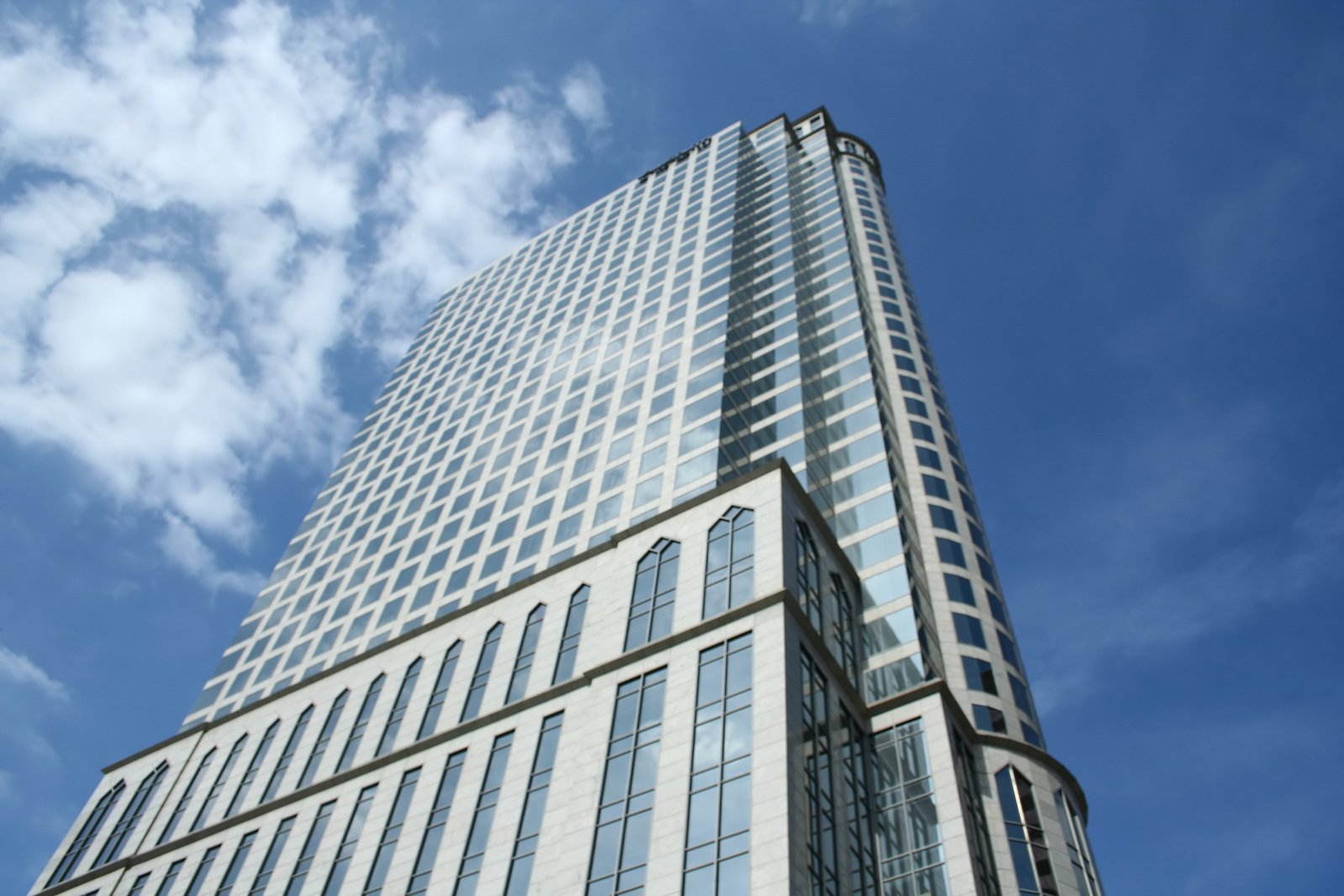 the top of the building looks up towards the sky