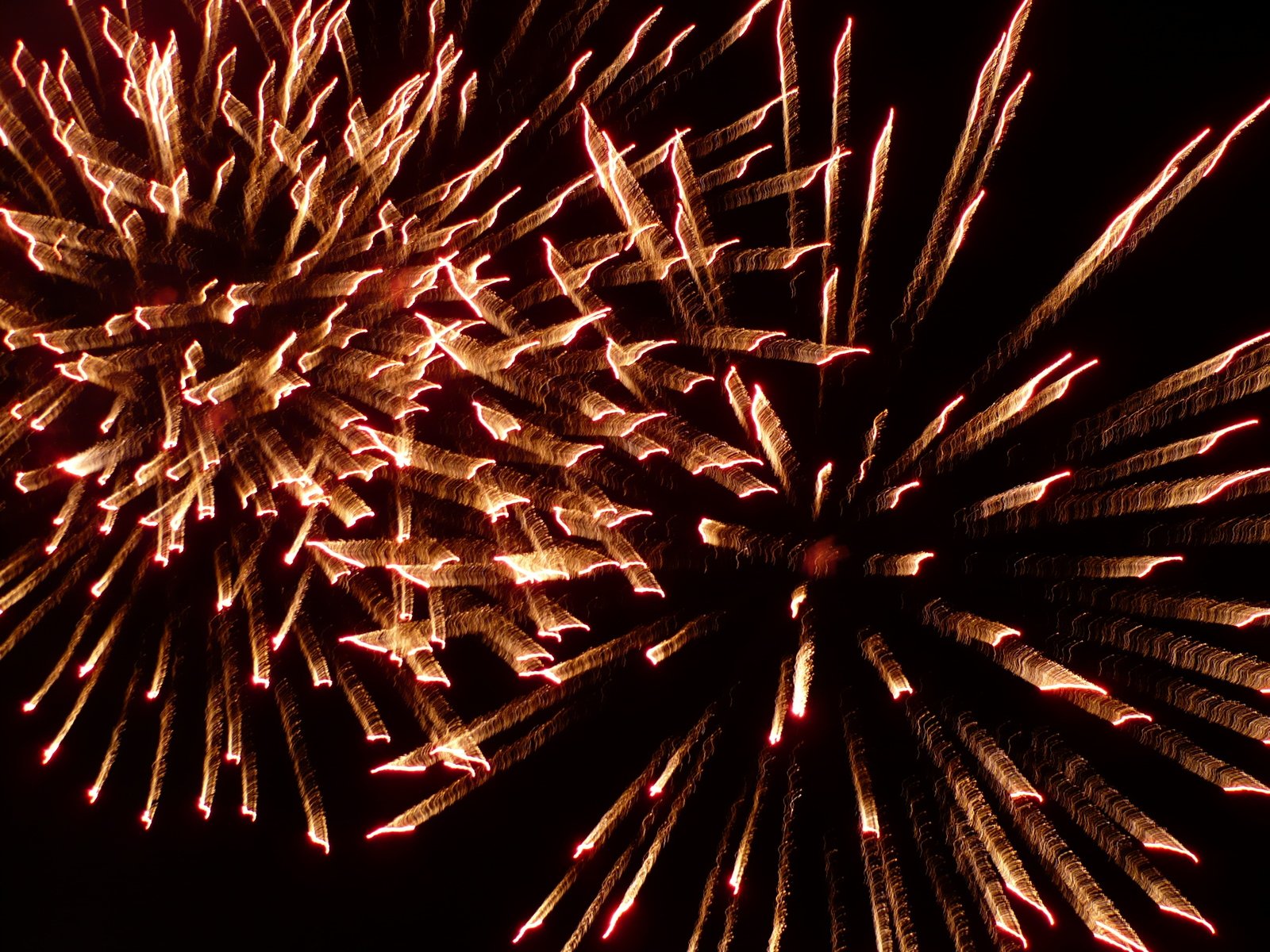 a close up view of fireworks in the sky