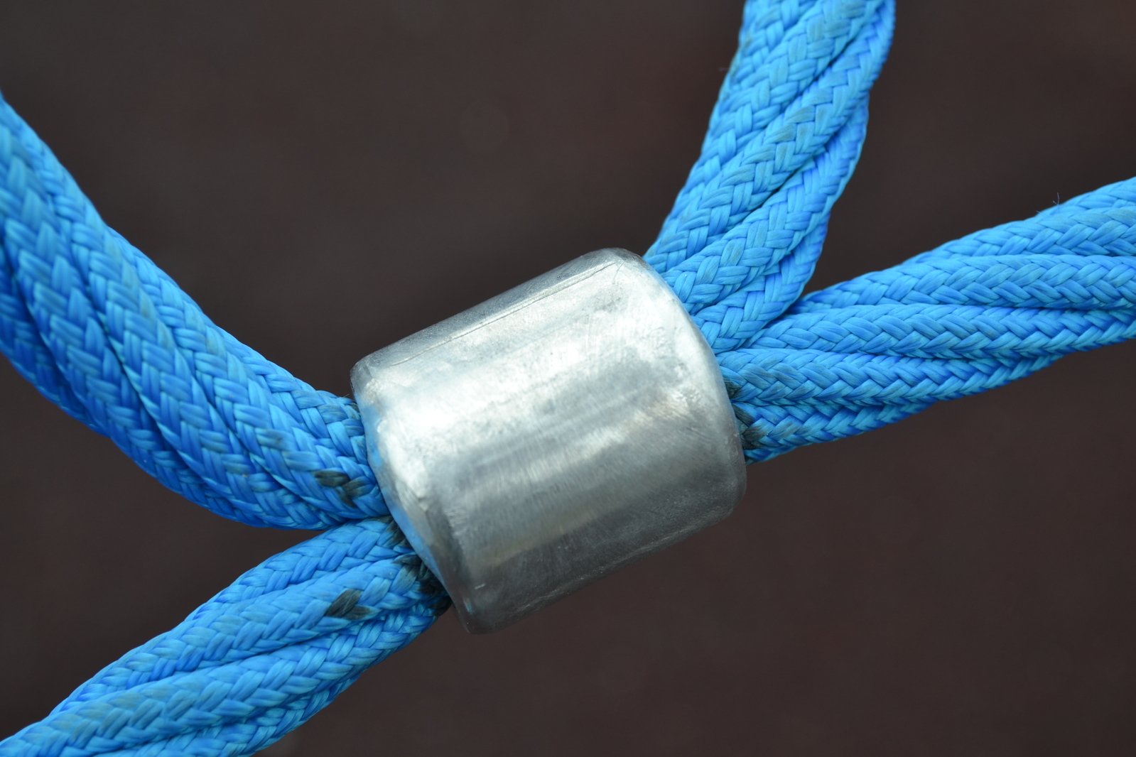 blue rope with a metal end and some steel ring