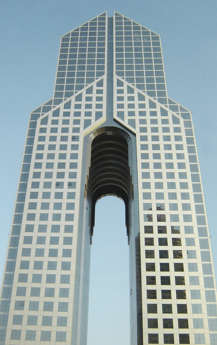 a tall building with many windows on top