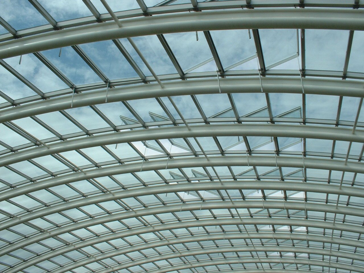 the ceiling of an airport is large and clean