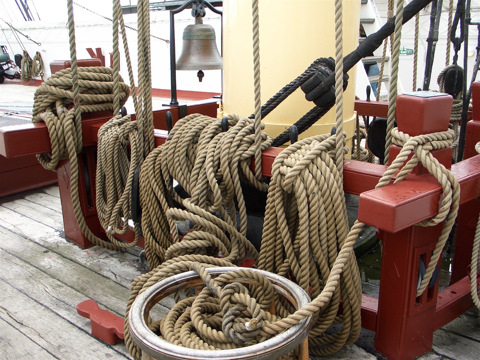 two old fashioned ships with ropes are  together