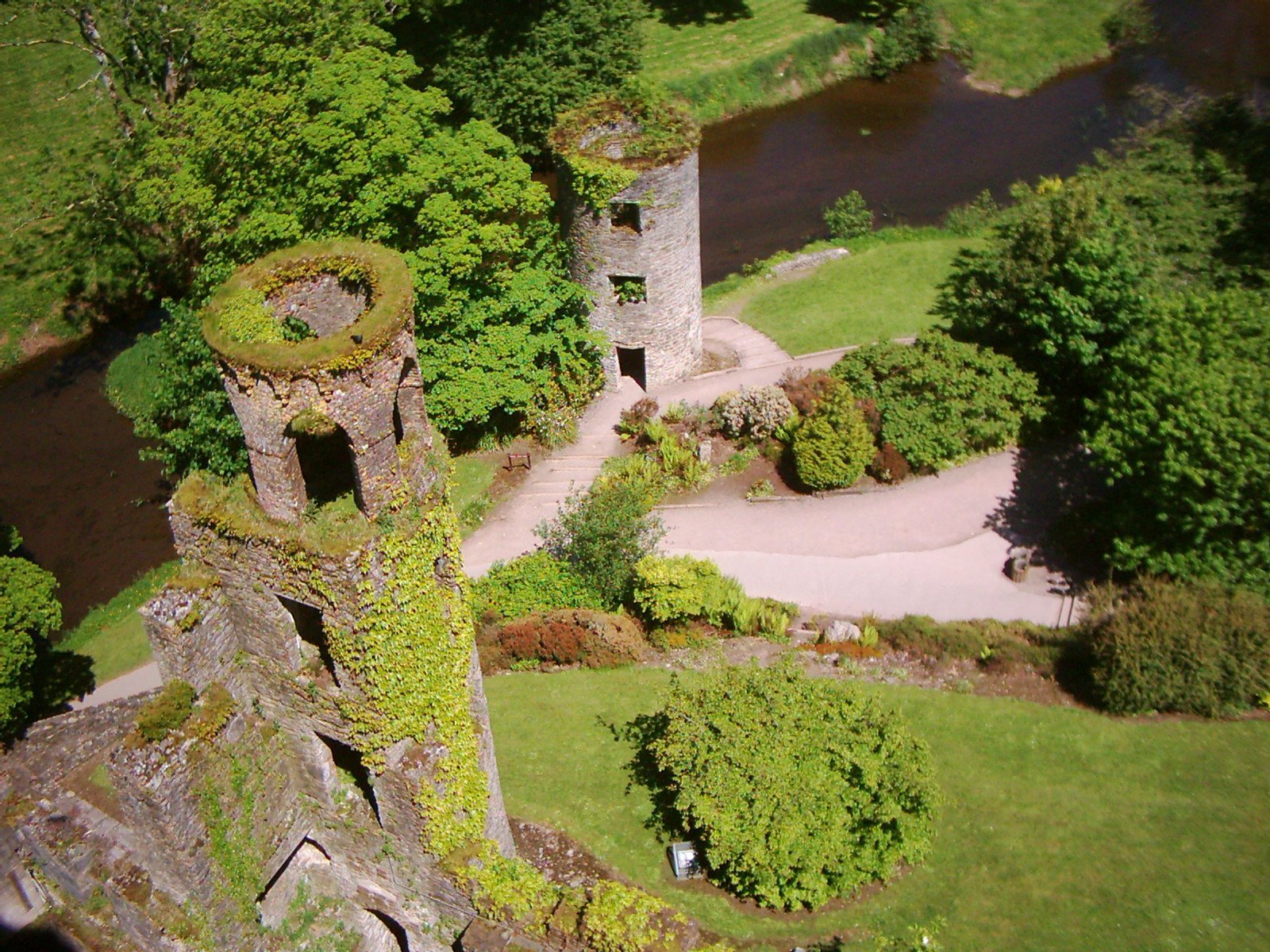 an aerial po of a castle like structure near a body of water