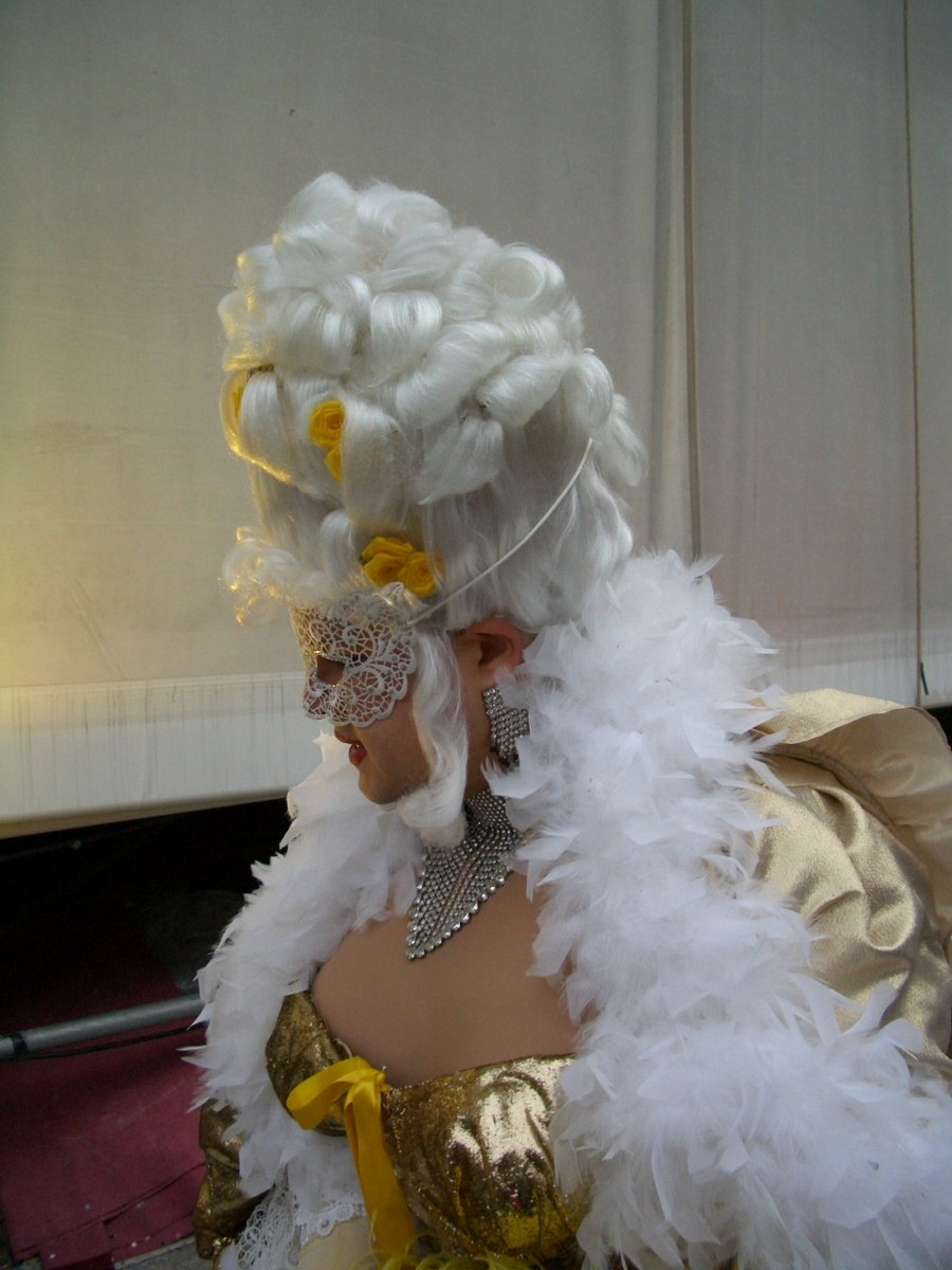 a close up of a person in costume