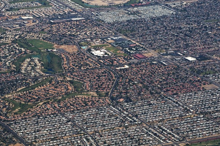 an aerial po of a town showing many homes
