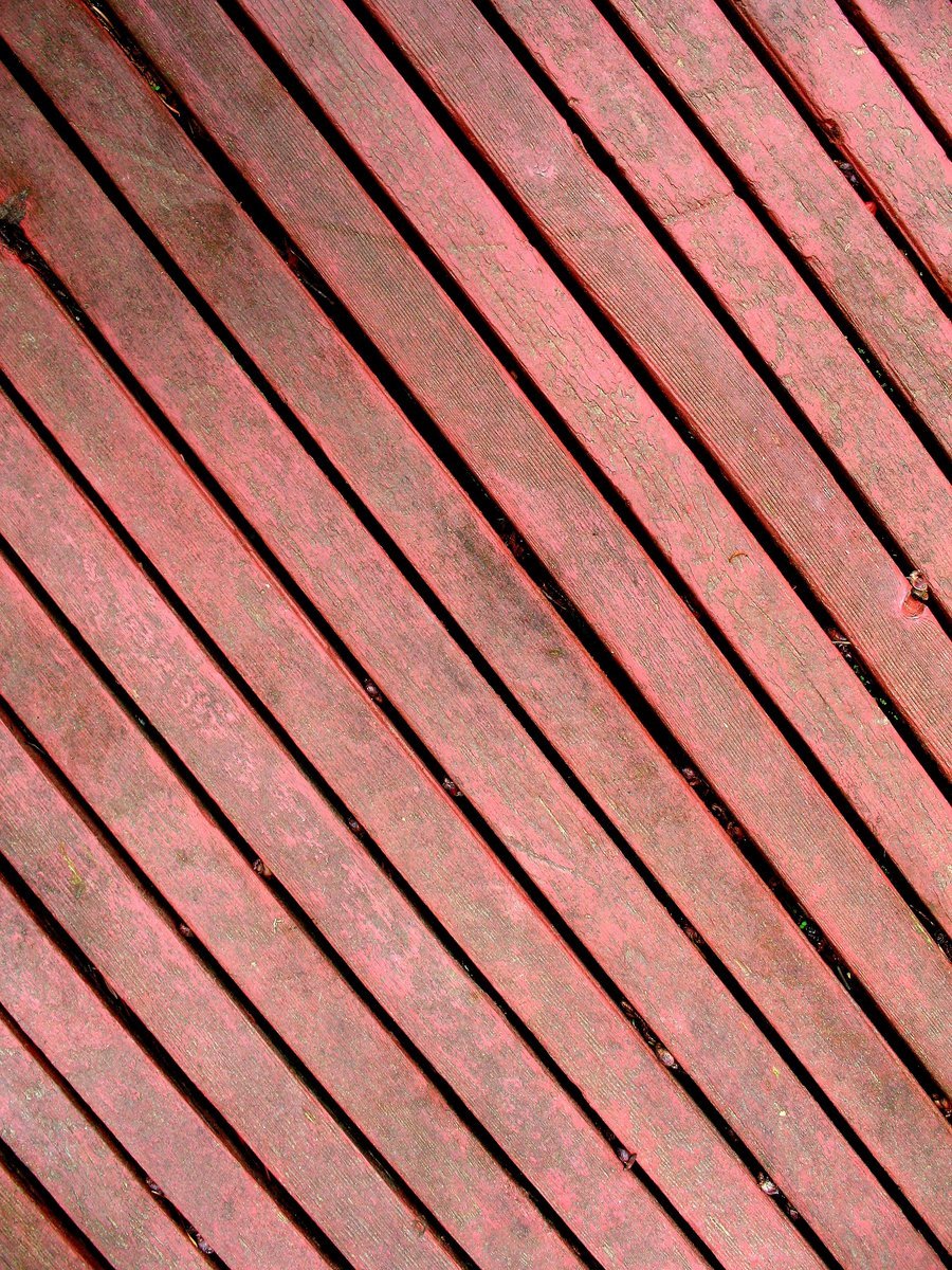a view from above of a red wooden floor