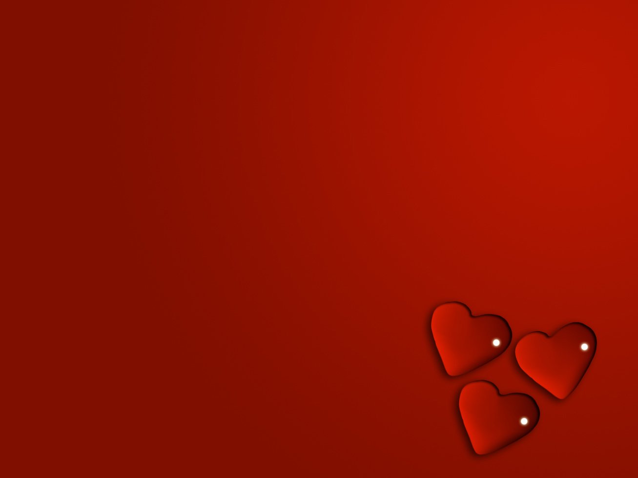 a red heart wallpaper with three hearts