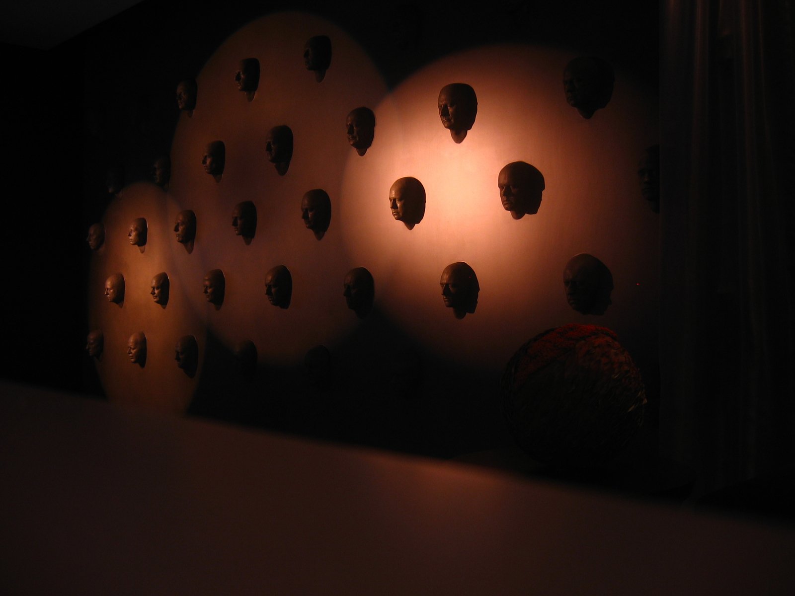 the dark room shows many light bulb lights