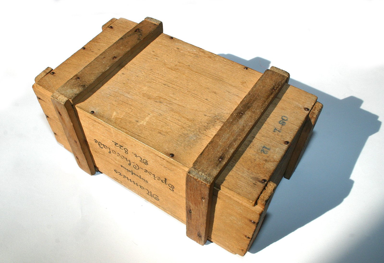 a wooden box with some words on it