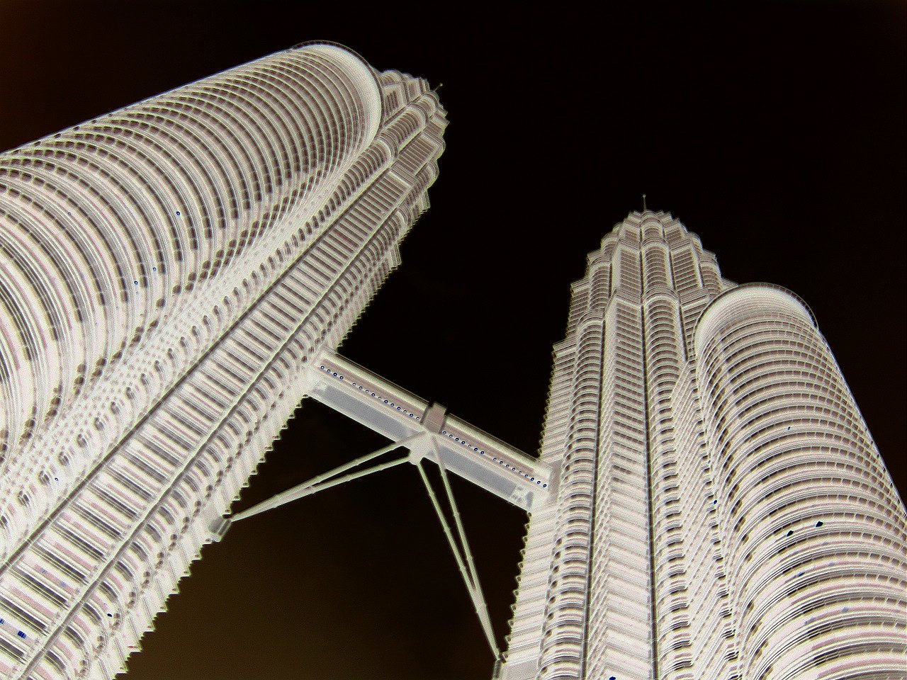 two tall buildings made up of multiple lines