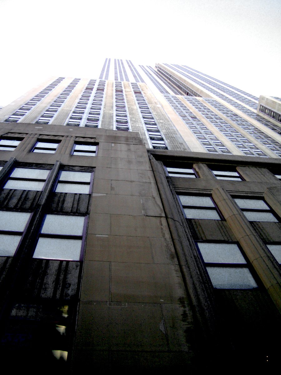 tall building in a city with lots of windows