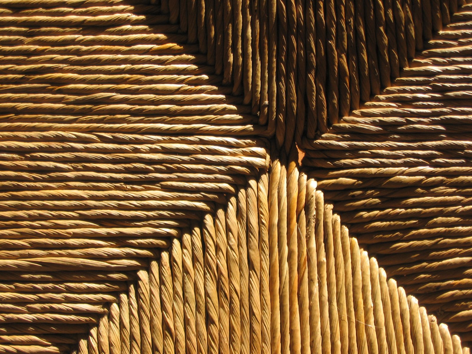 closeup of several different brown woven cords