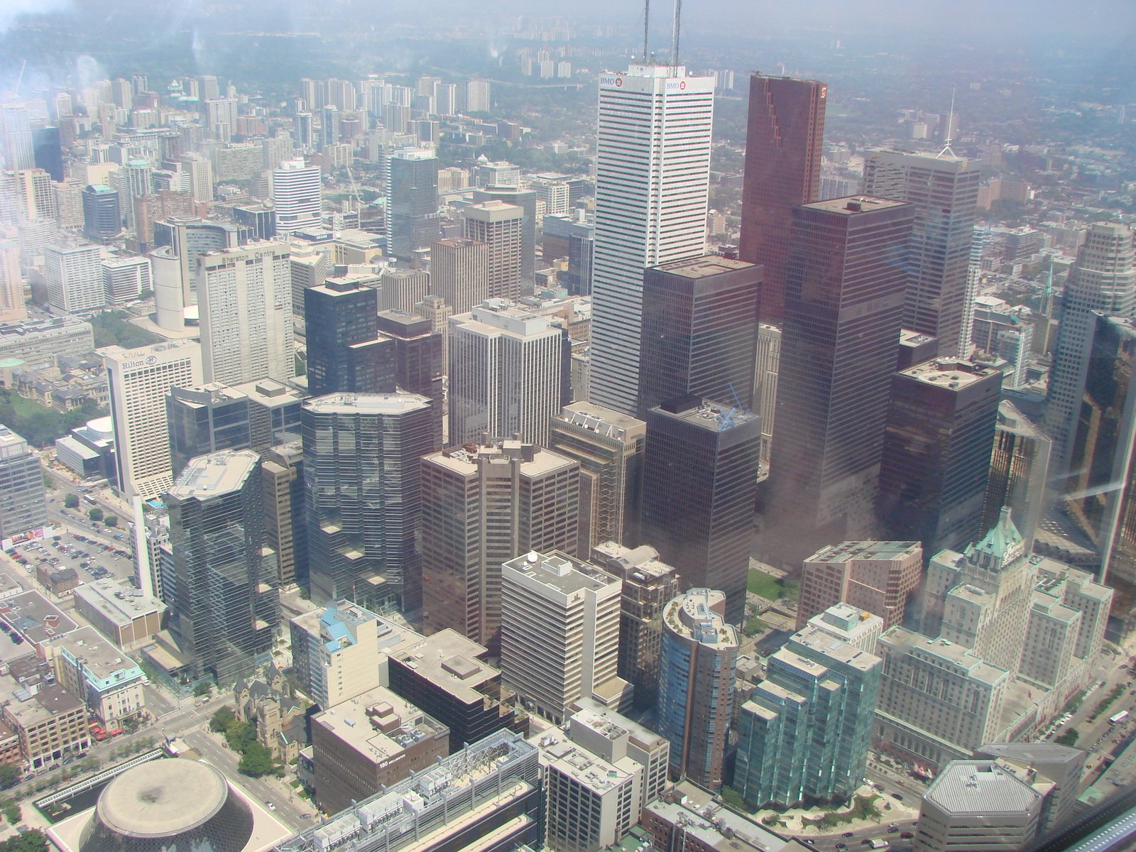 some very tall buildings and some water in the city