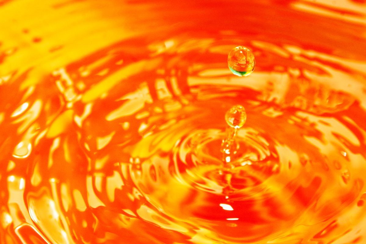 close up pograph of water and liquid from a yellow object