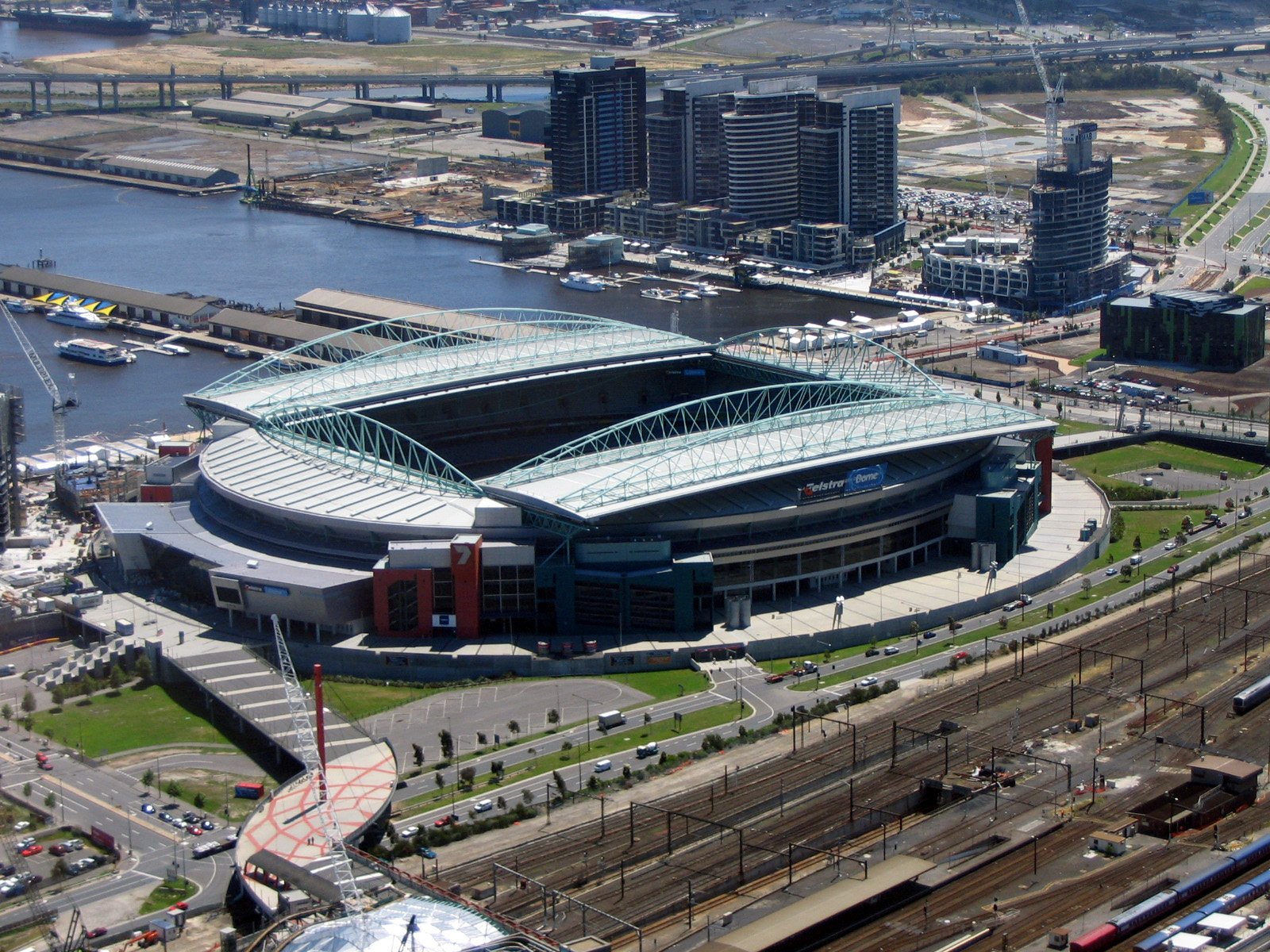 a very big stadium in the middle of a city