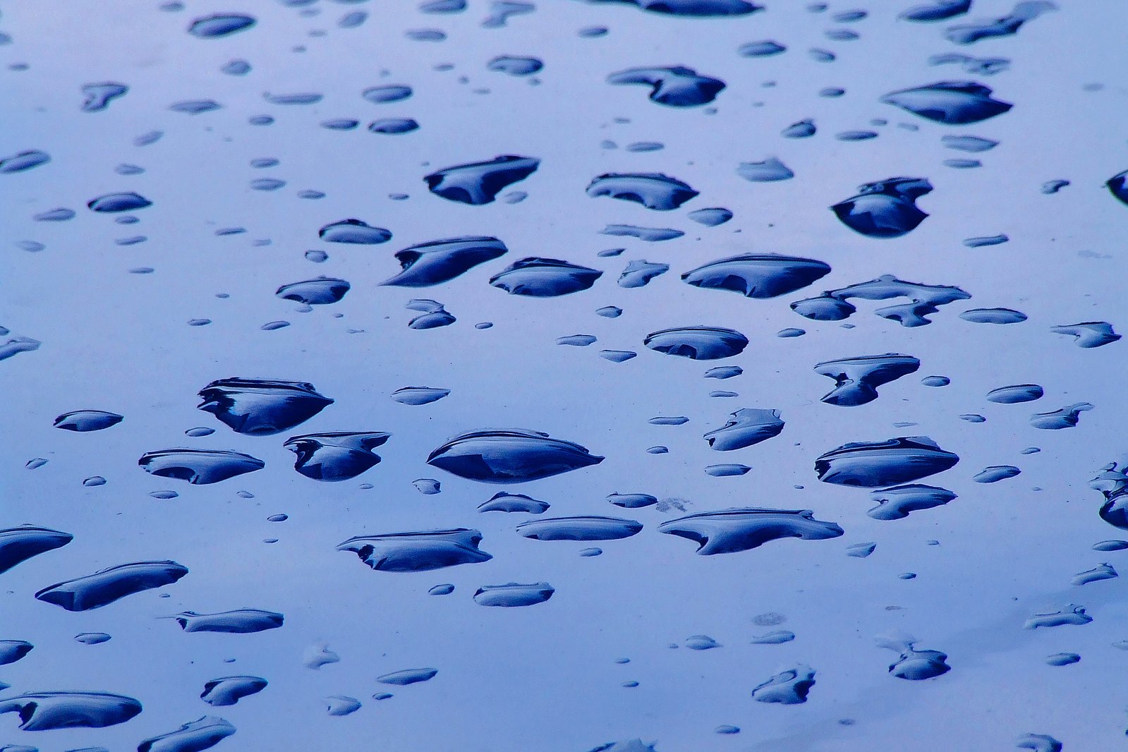 rain drops in the blue sky during a rain storm