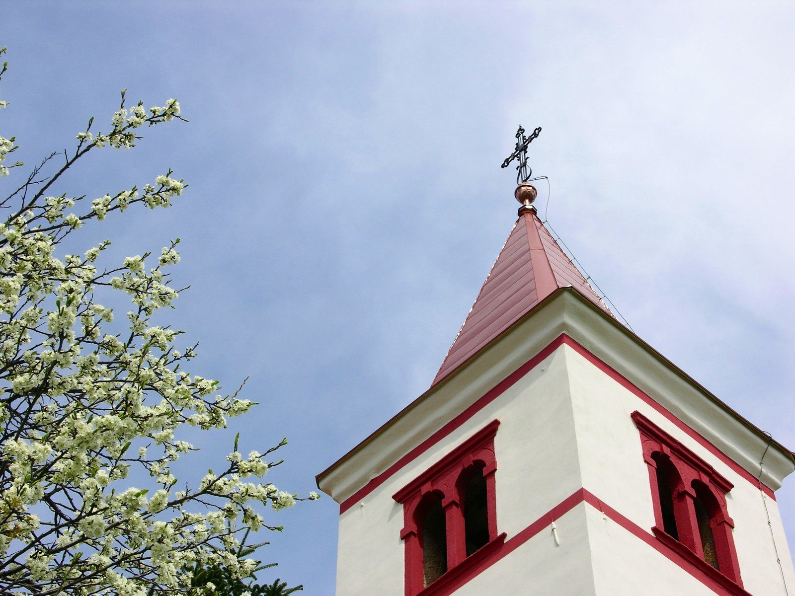 a tall tower with clocks built into it