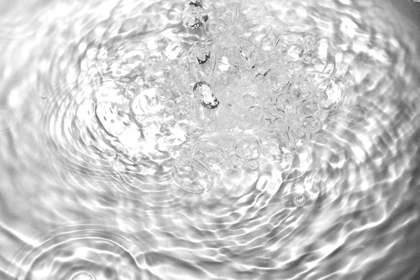 a water source is shown with several droplets
