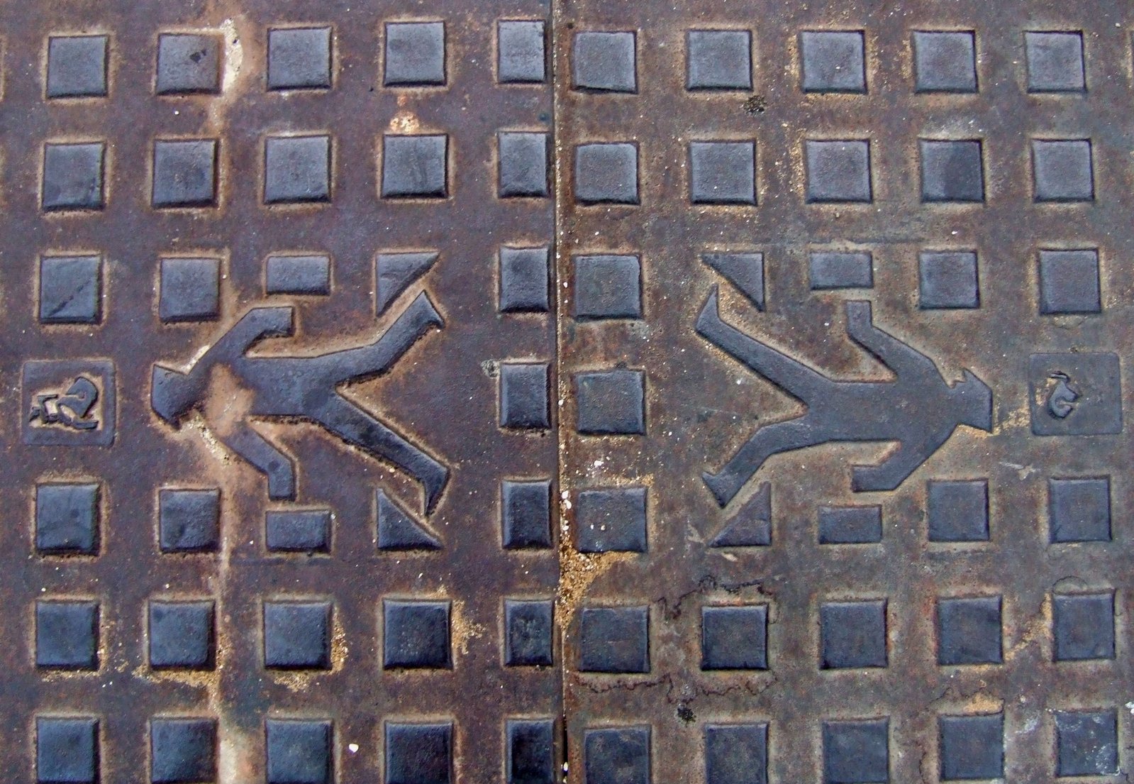 two pictures show different styles of walk street signs